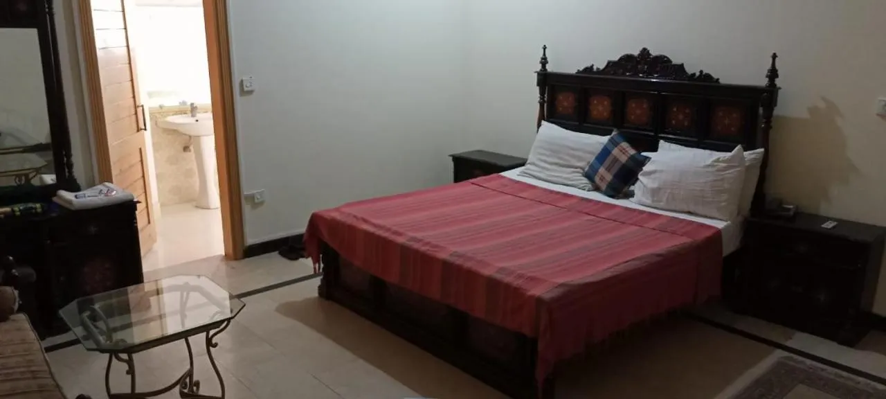 Photo of the whole room, Bed in Luxury Palace Peshawar