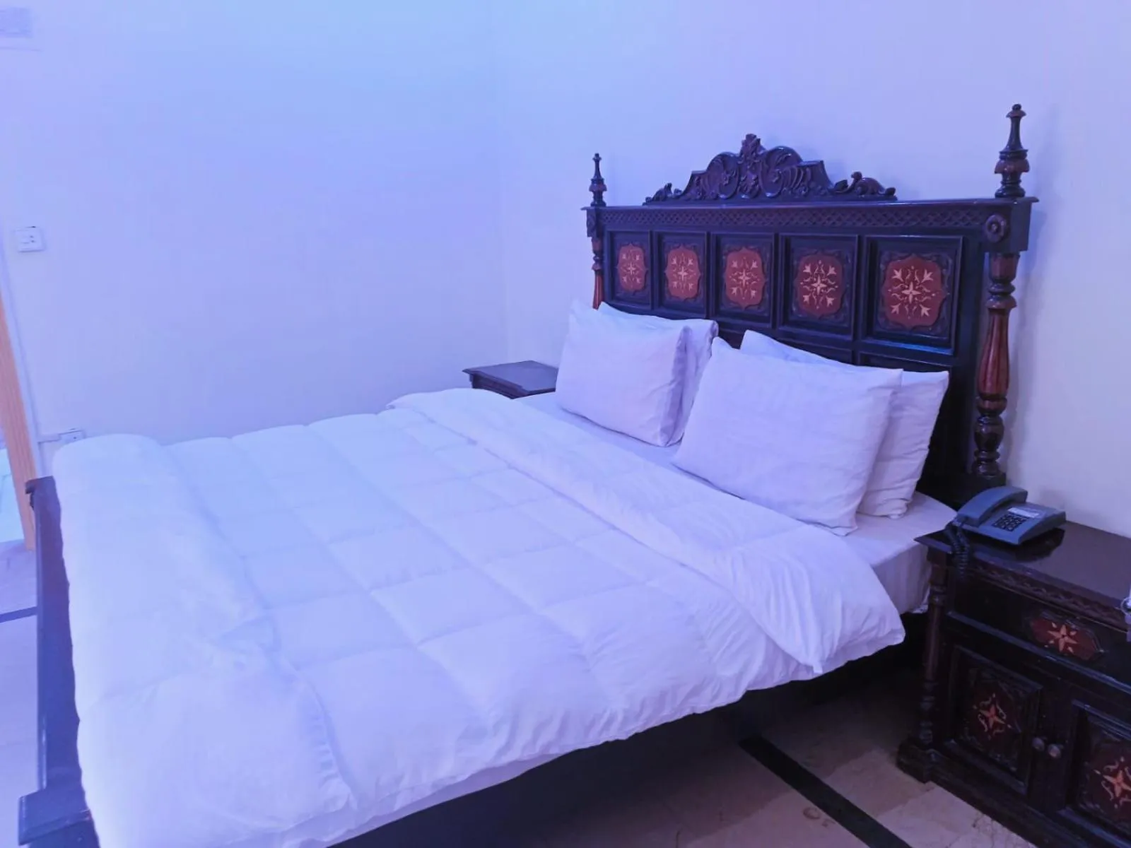 Photo of the whole room, Bed in Luxury Palace Peshawar