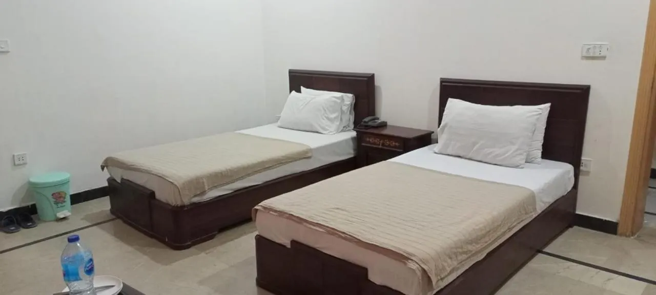 Photo of the whole room, Bed in Luxury Palace Peshawar
