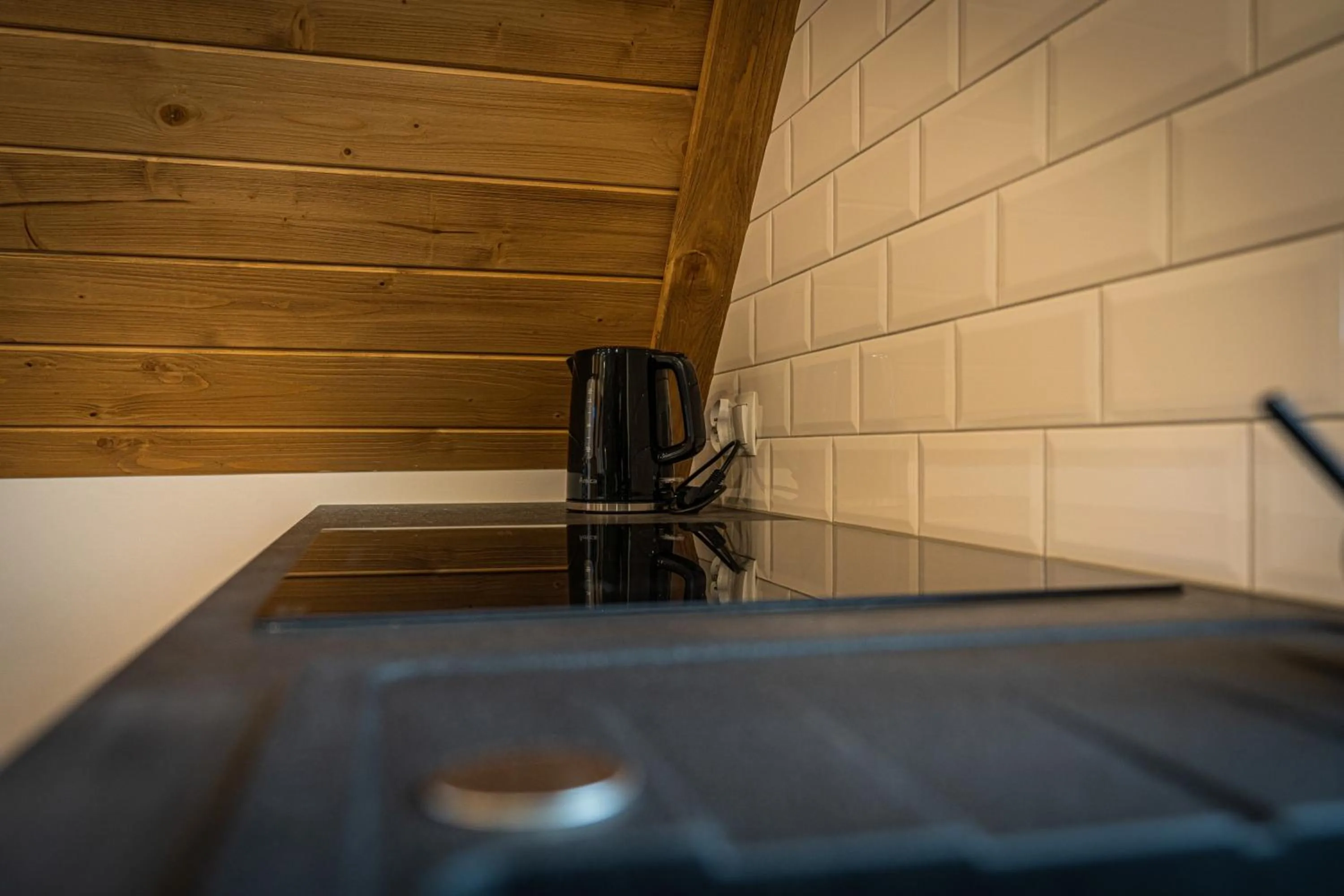 stove in Dworek nad Jałowcami z Jacuzzi