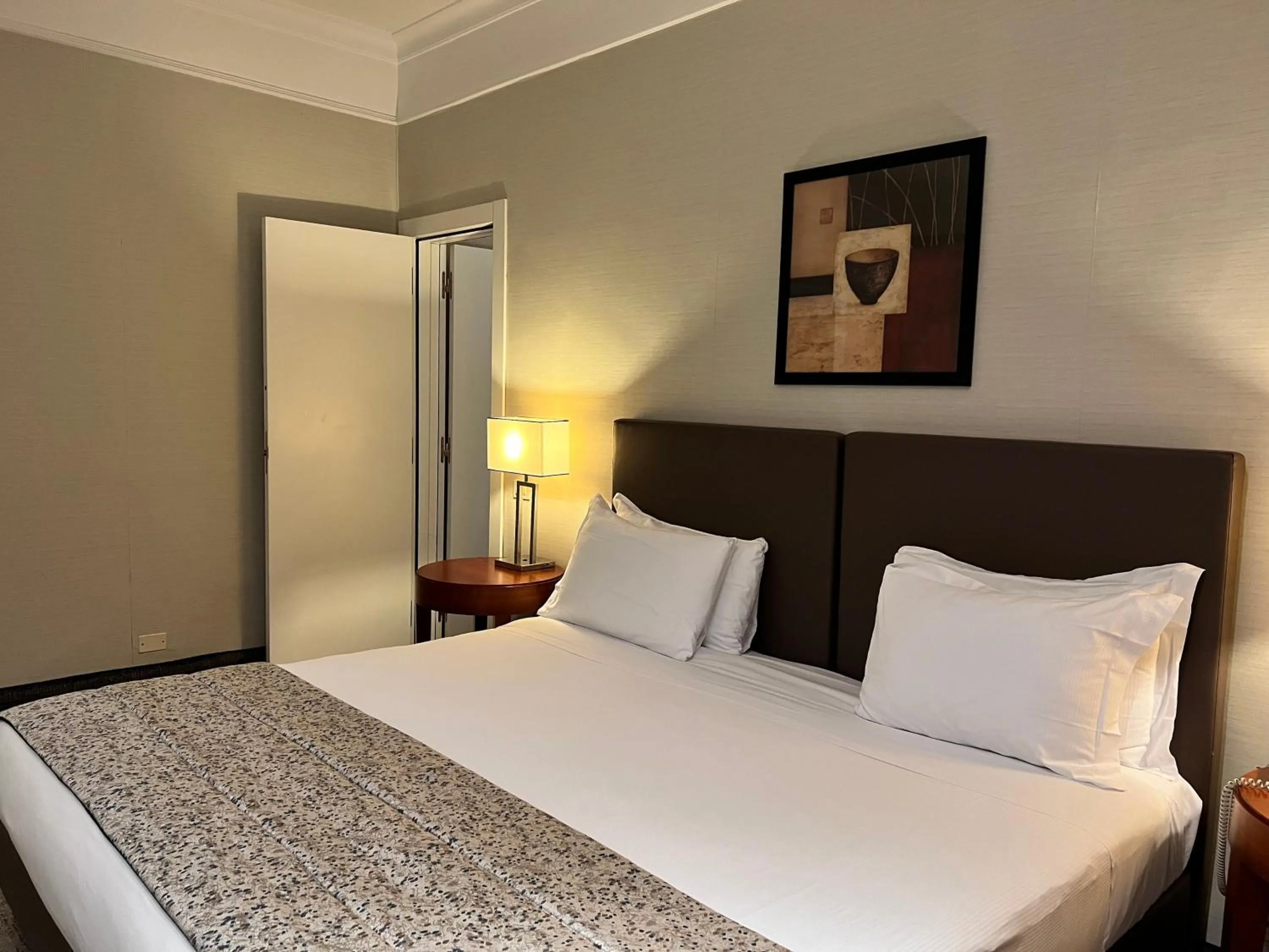 Photo of the whole room, Bed in Crowne Plaza Rome St. Peter's by IHG