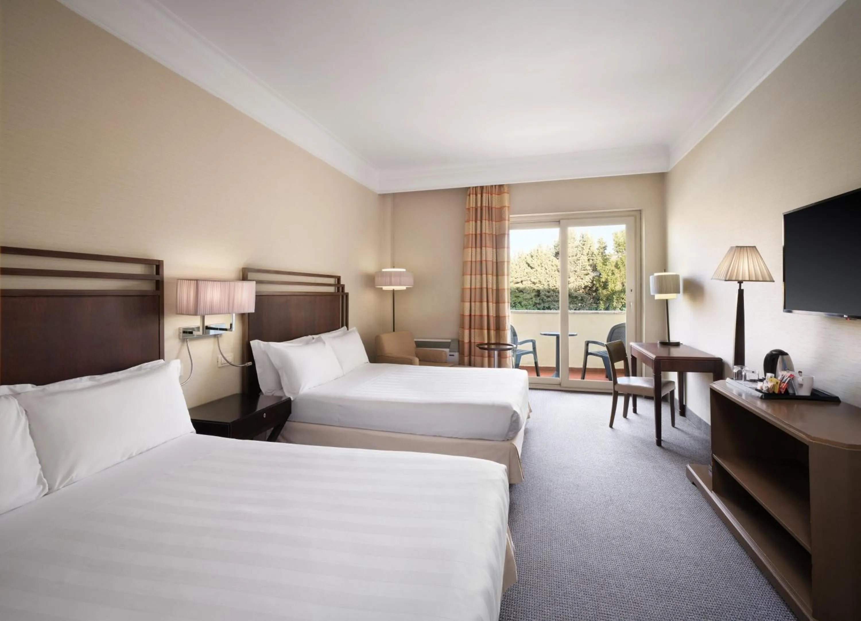 Photo of the whole room, Bed in Crowne Plaza Rome St. Peter's by IHG