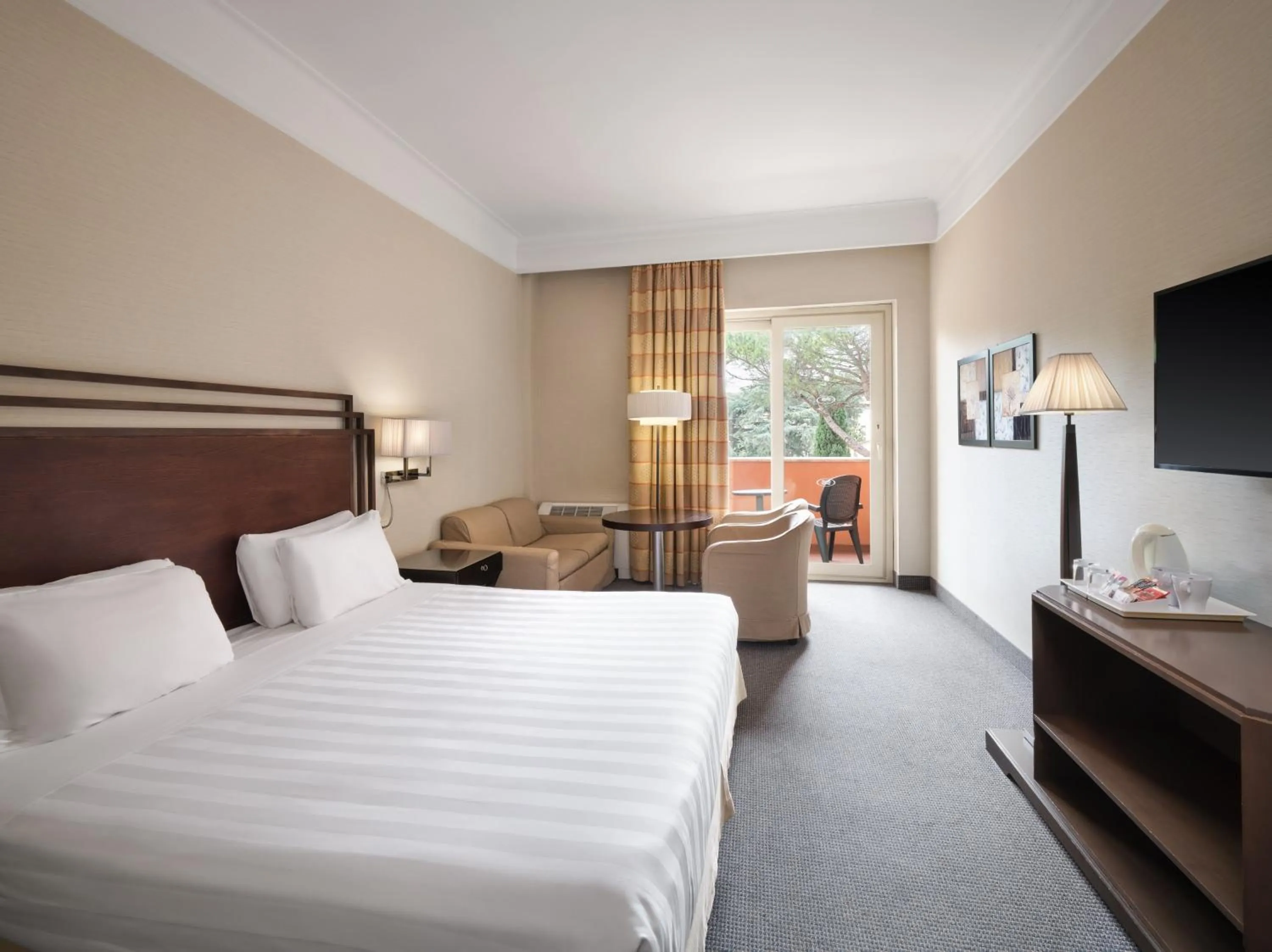 Photo of the whole room, Bed in Crowne Plaza Rome St. Peter's by IHG