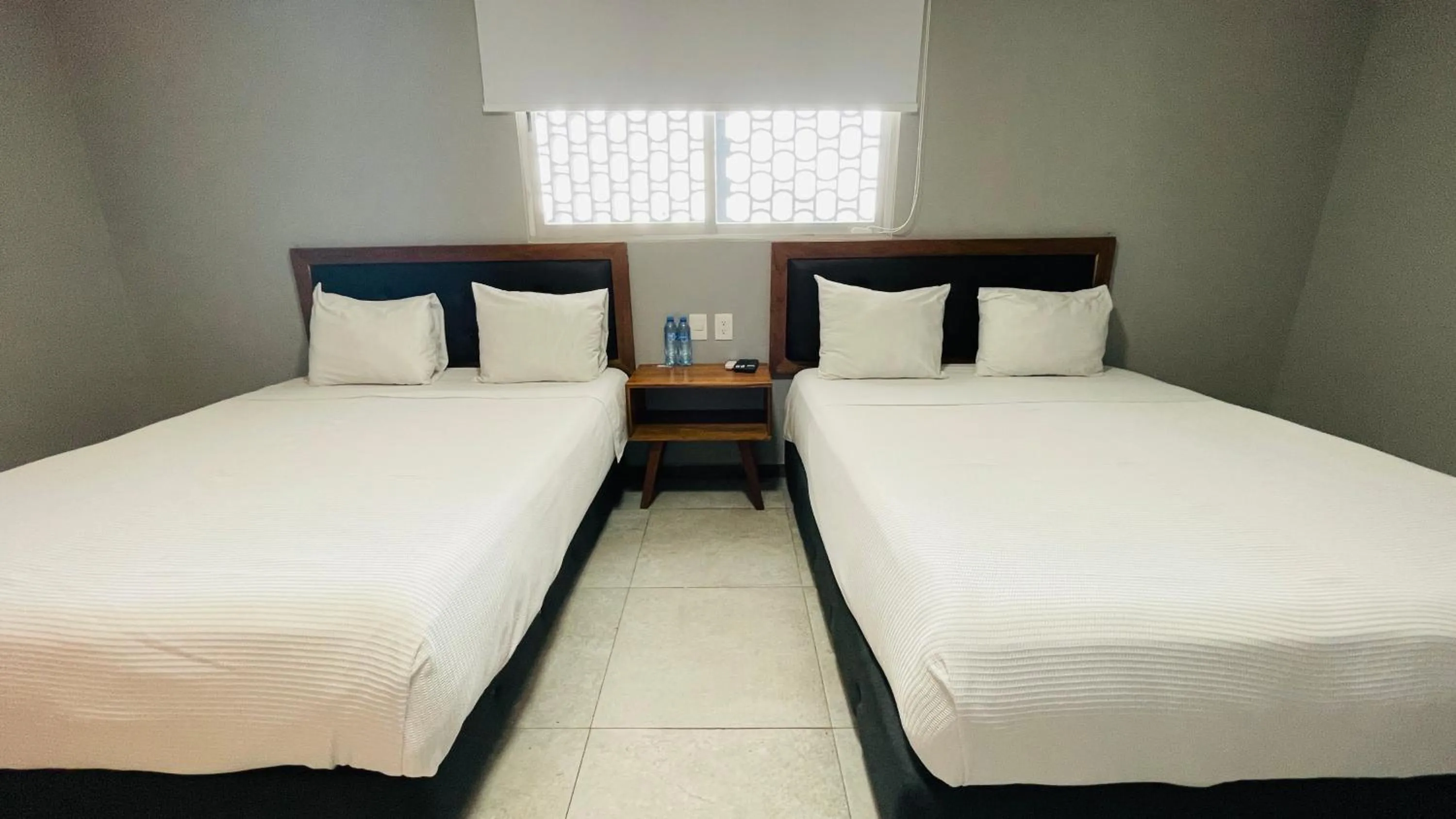 Photo of the whole room, Bed in HIT Merida Hotel Boutique