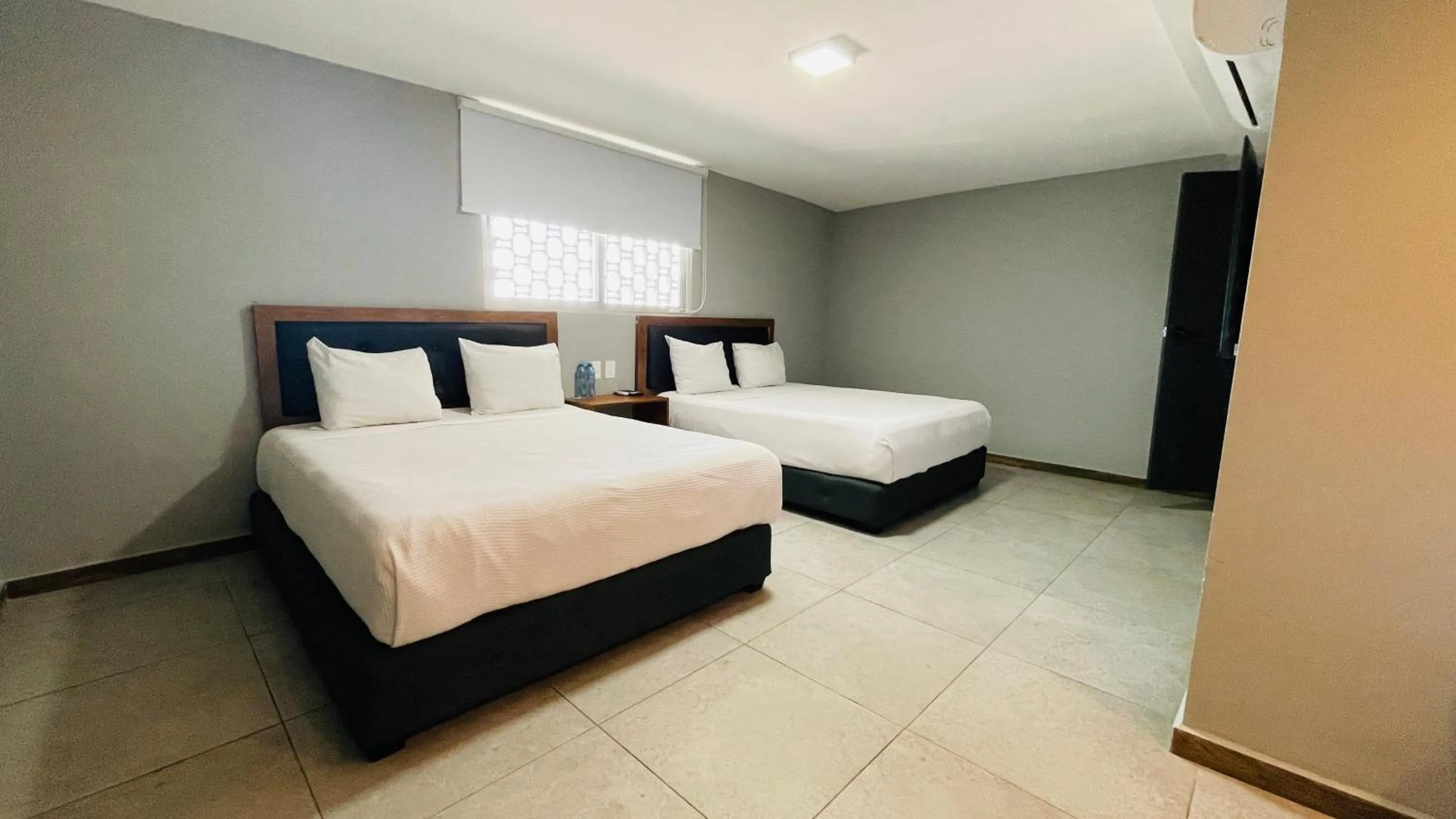 Photo of the whole room, Bed in HIT Merida Hotel Boutique