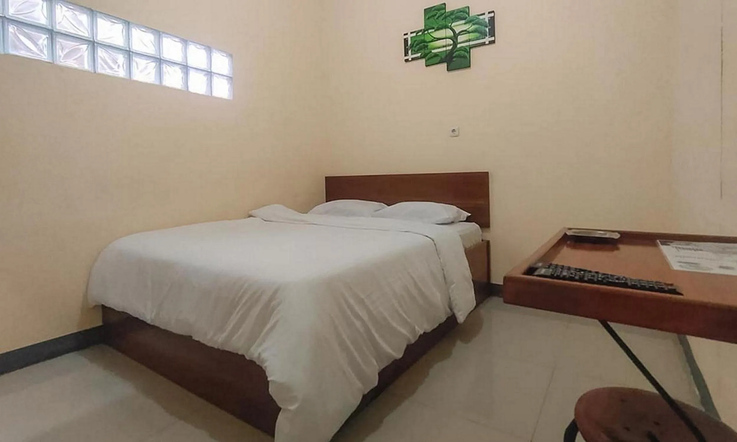 Bed in RedDoorz @ Merauke City Center