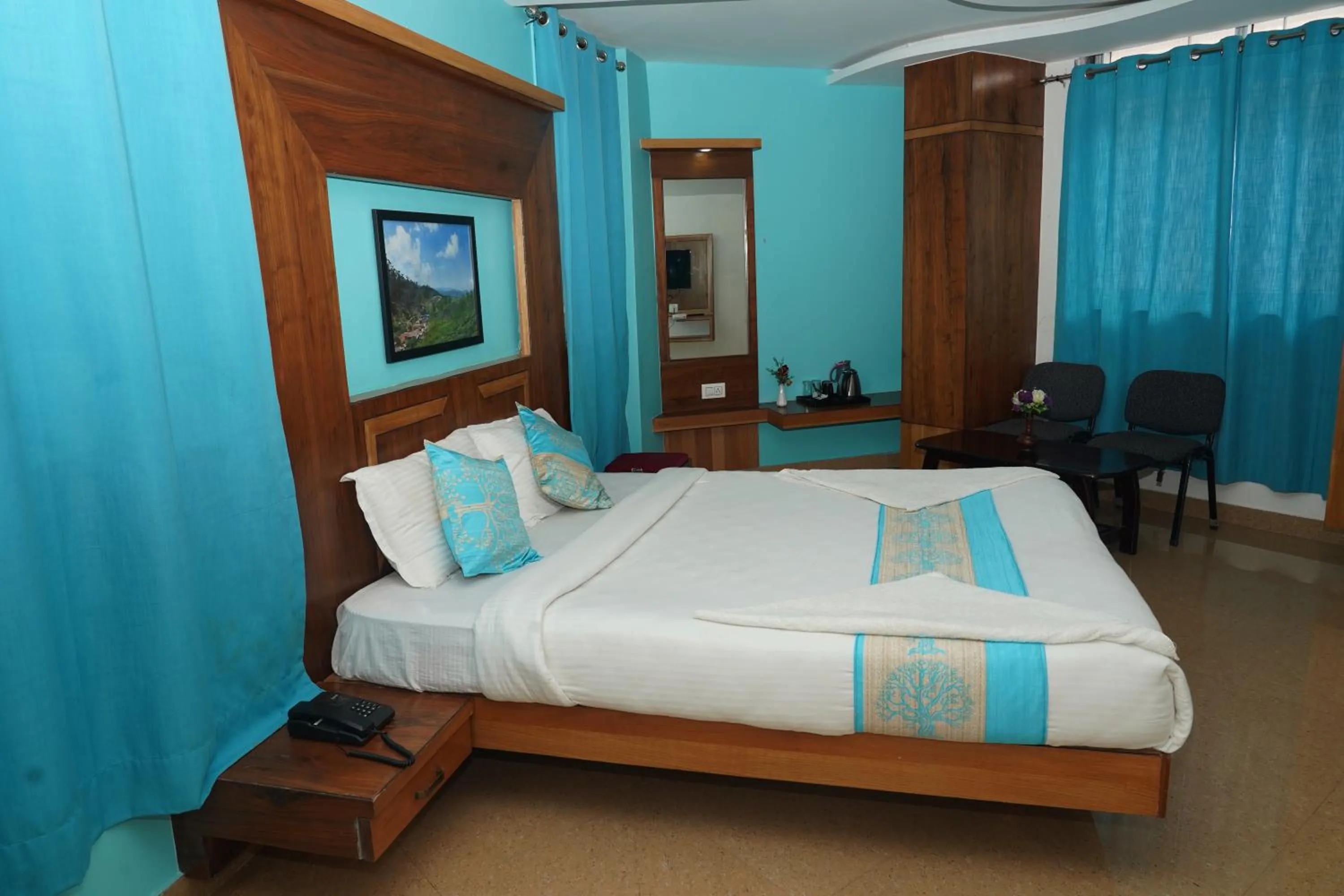 Bed in Anika Palace by Pepe Inn Hotel
