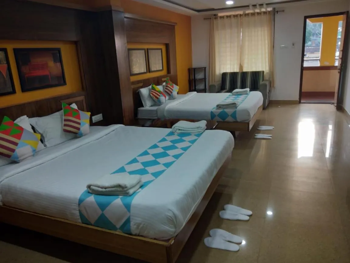 Bed in Anika Palace by Pepe Inn Hotel