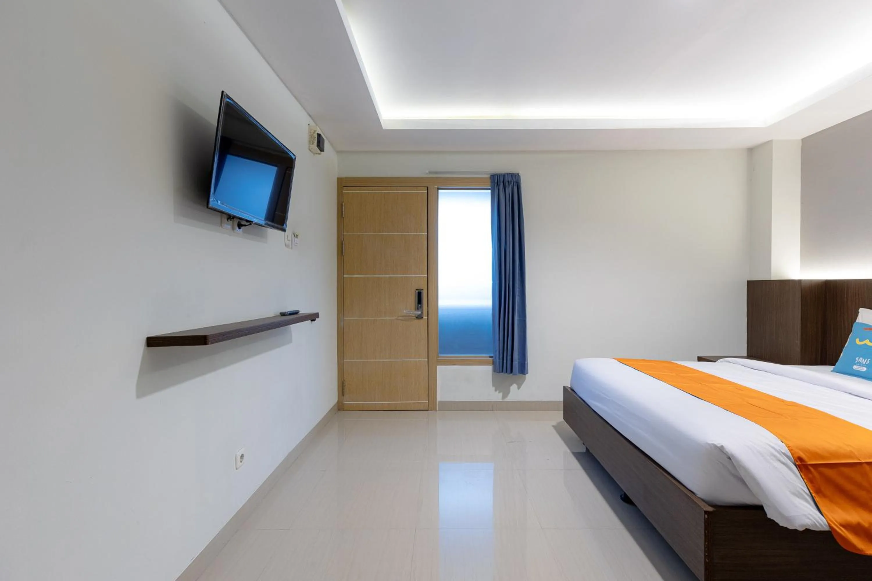Bedroom, Bed in Sans Hotel Rumah Kita Daan Mogot by RedDoorz