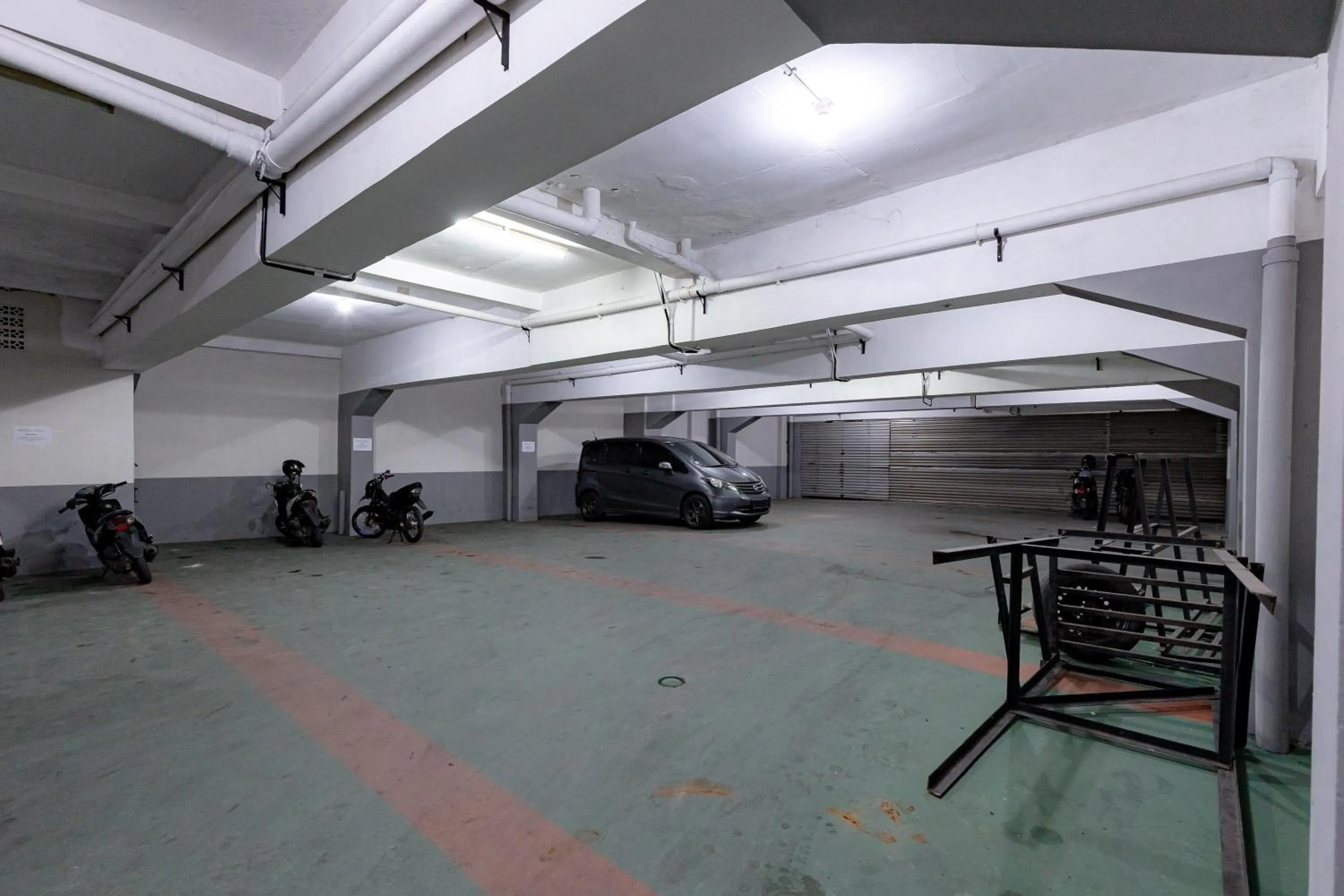Parking in Sans Hotel Rumah Kita Daan Mogot by RedDoorz