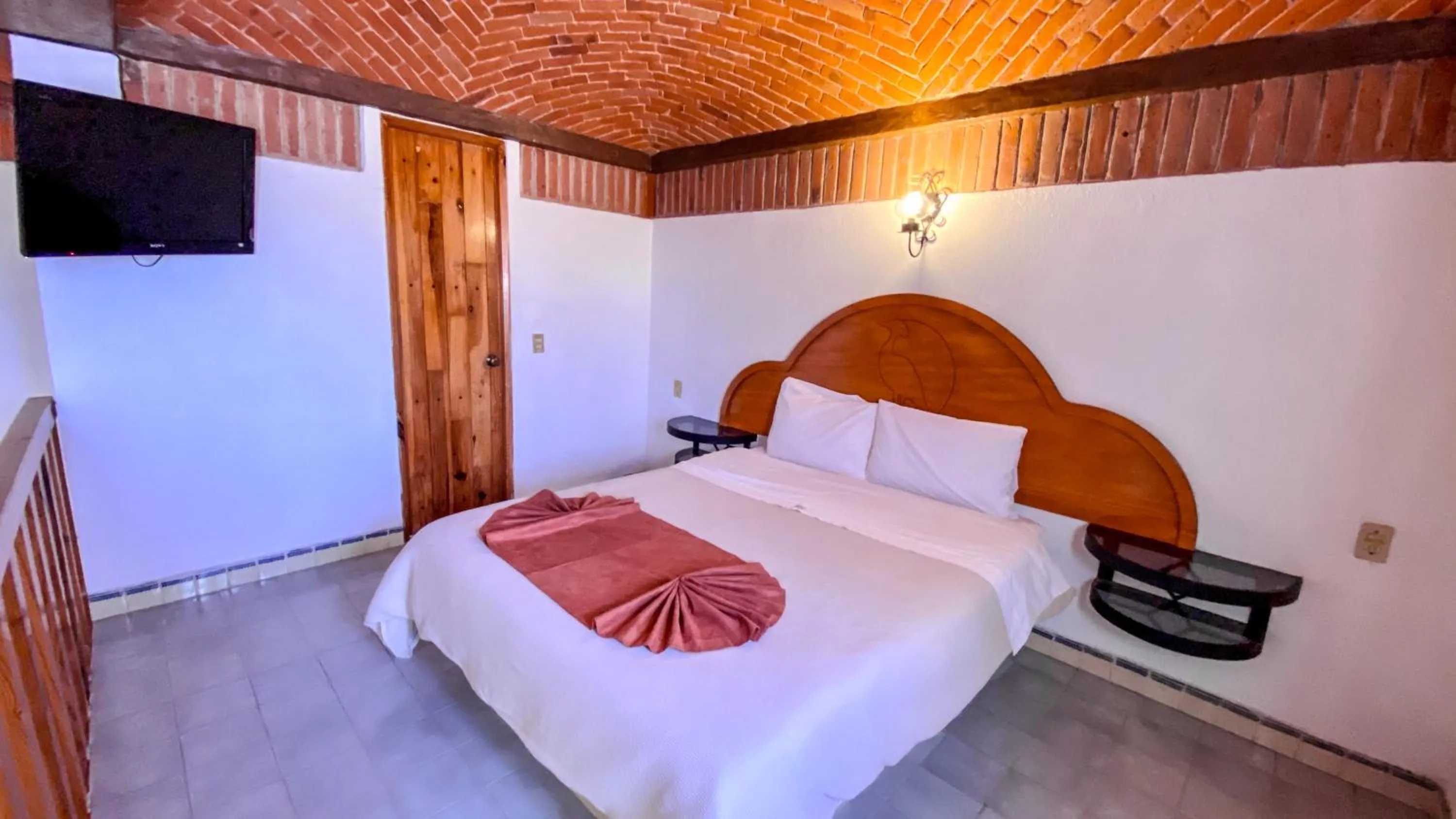 Bed in Suites Paraiso Tequis