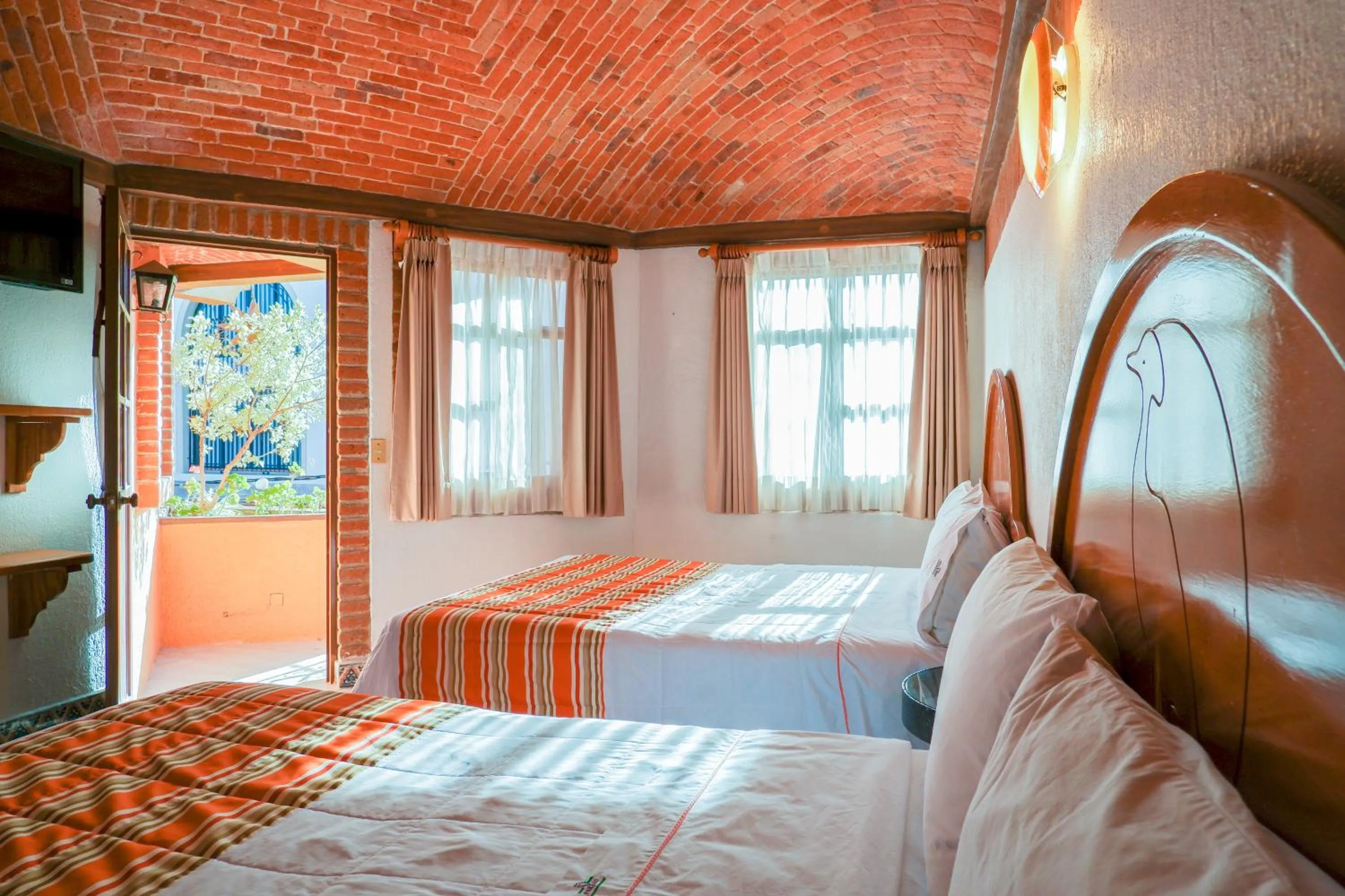 Bed in Suites Paraiso Tequis