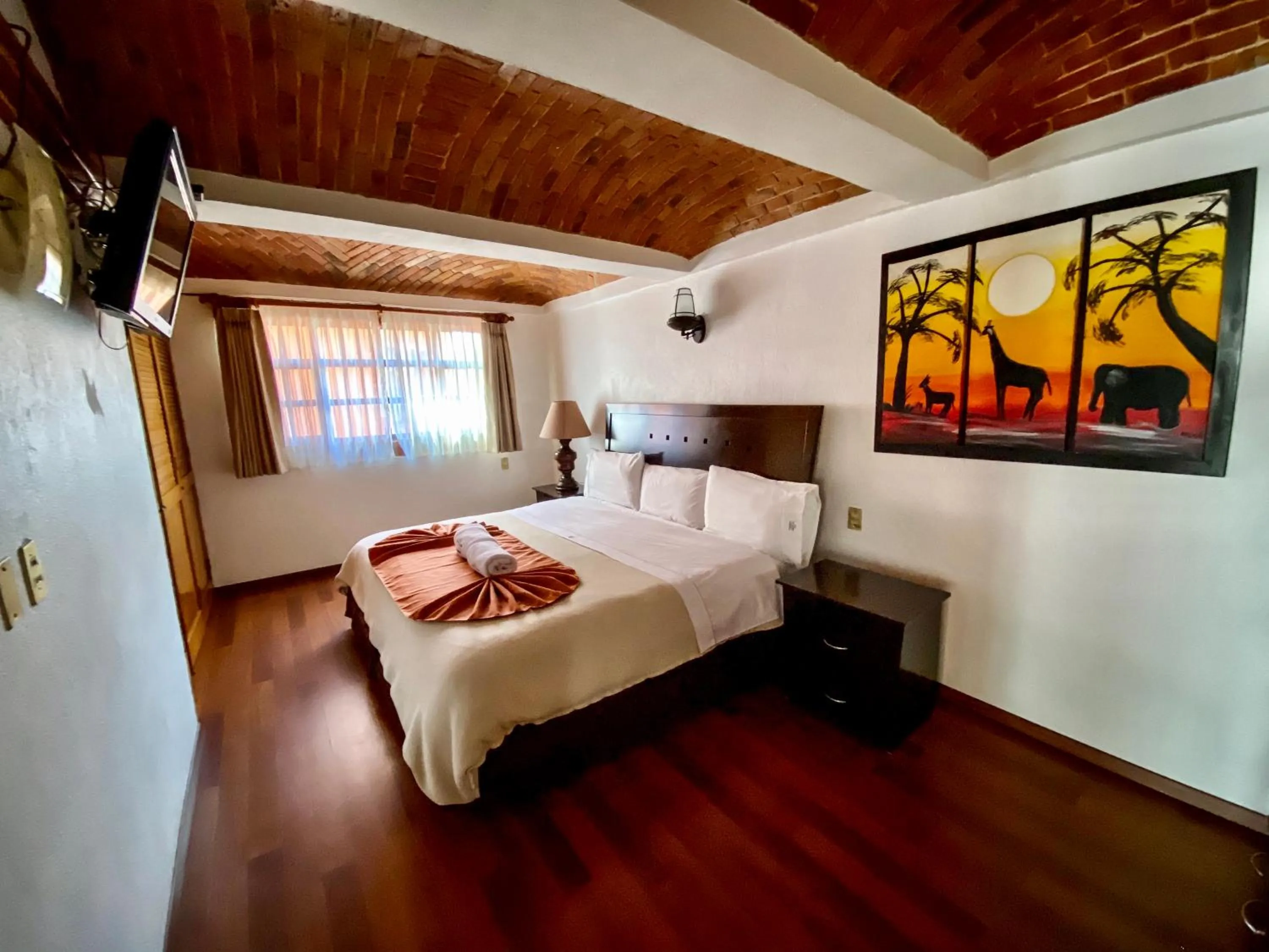 Bed in Suites Paraiso Tequis