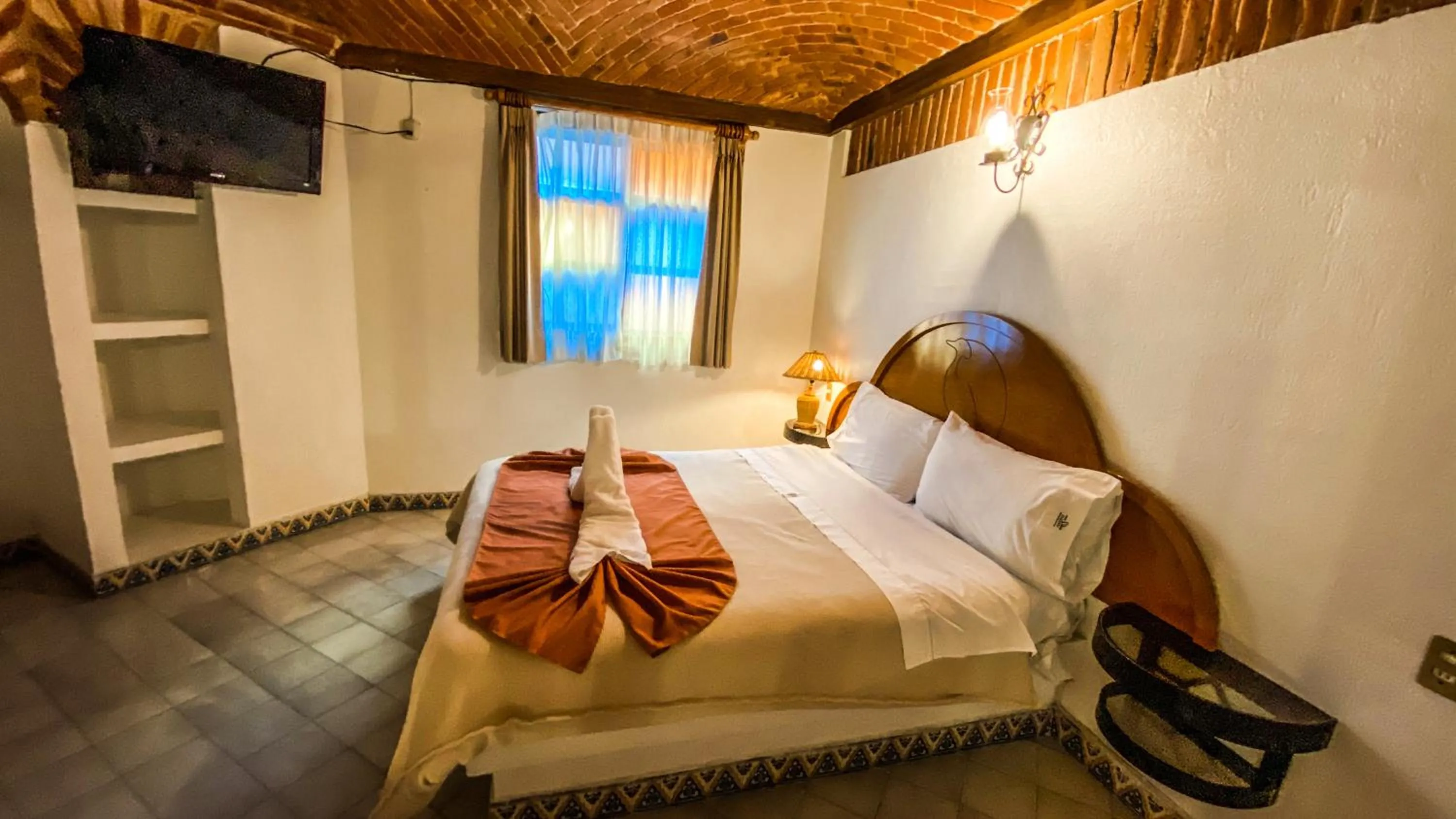 Bed in Suites Paraiso Tequis