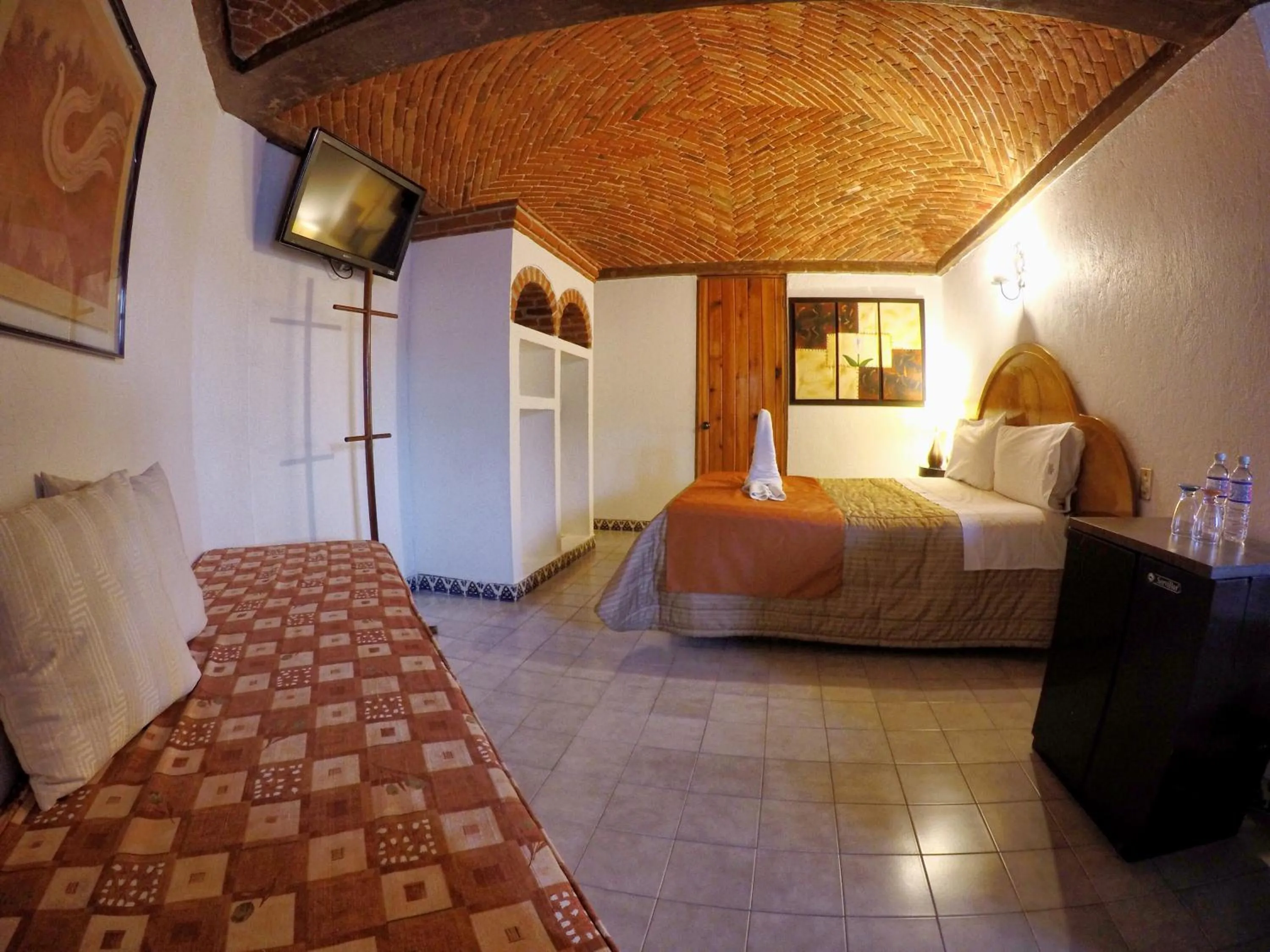 Bed in Suites Paraiso Tequis