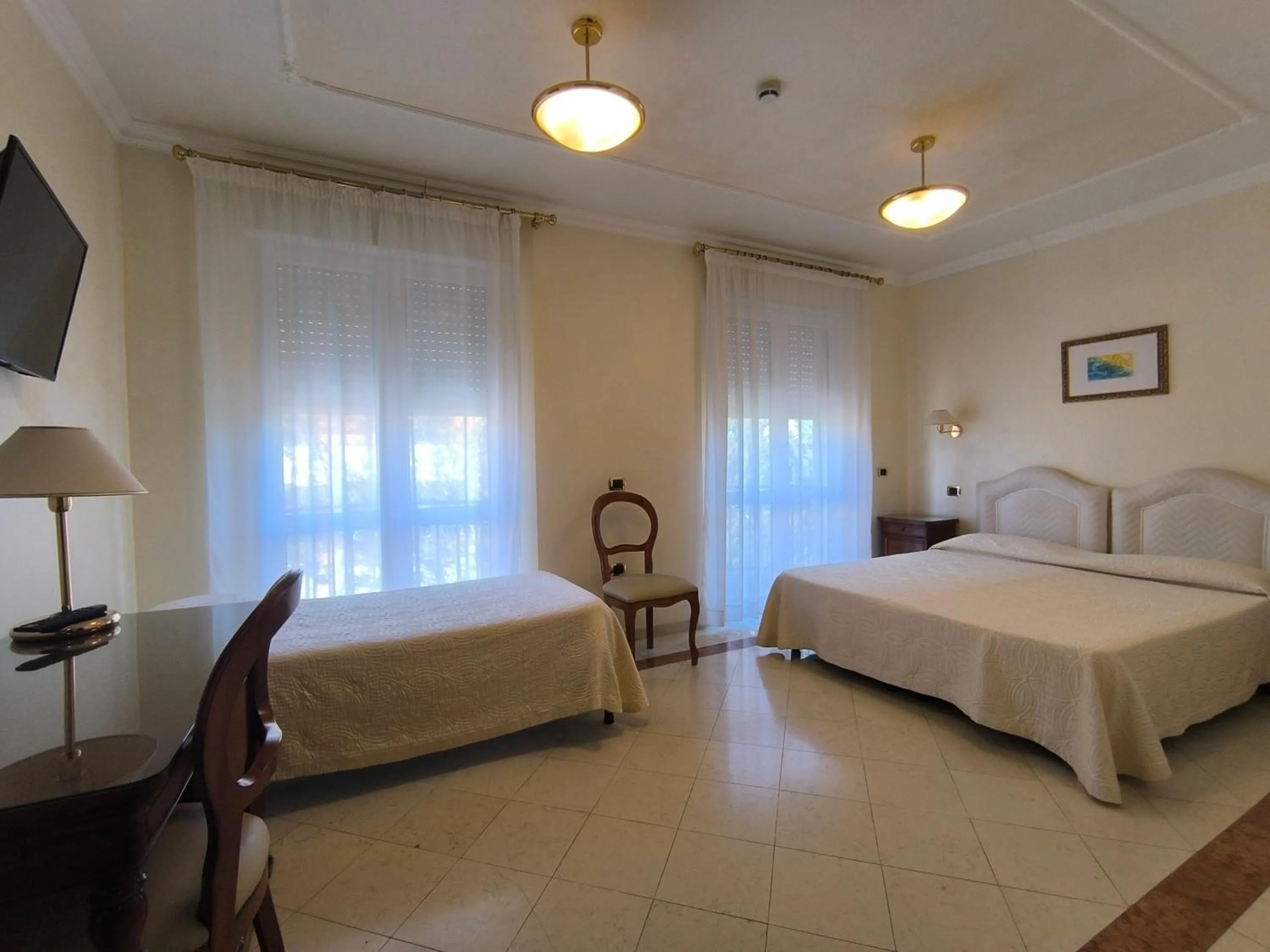 Bed in Mariano IV Palace Hotel