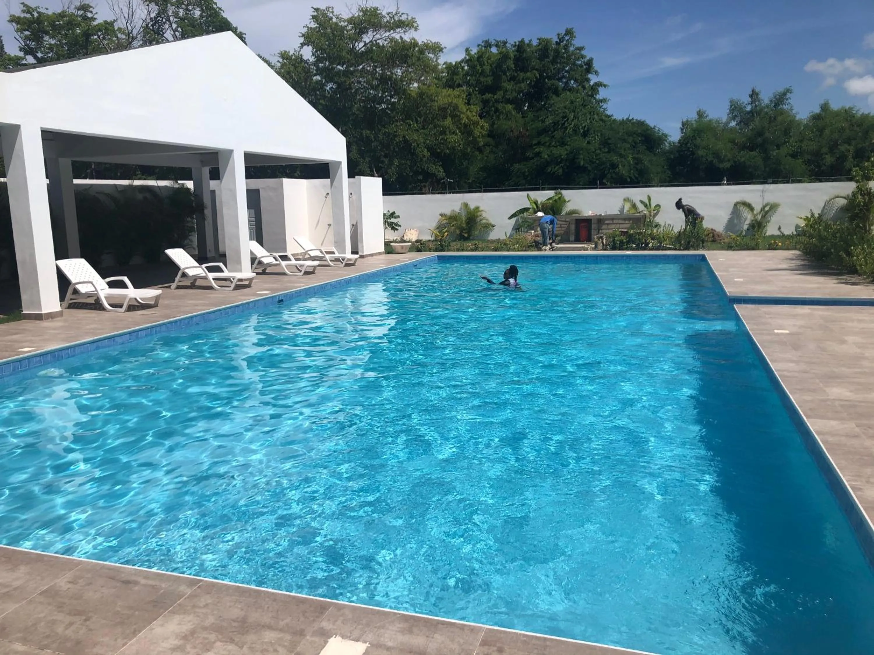 Swimming pool in Precioso Apartamento a solo pasos de la Playa