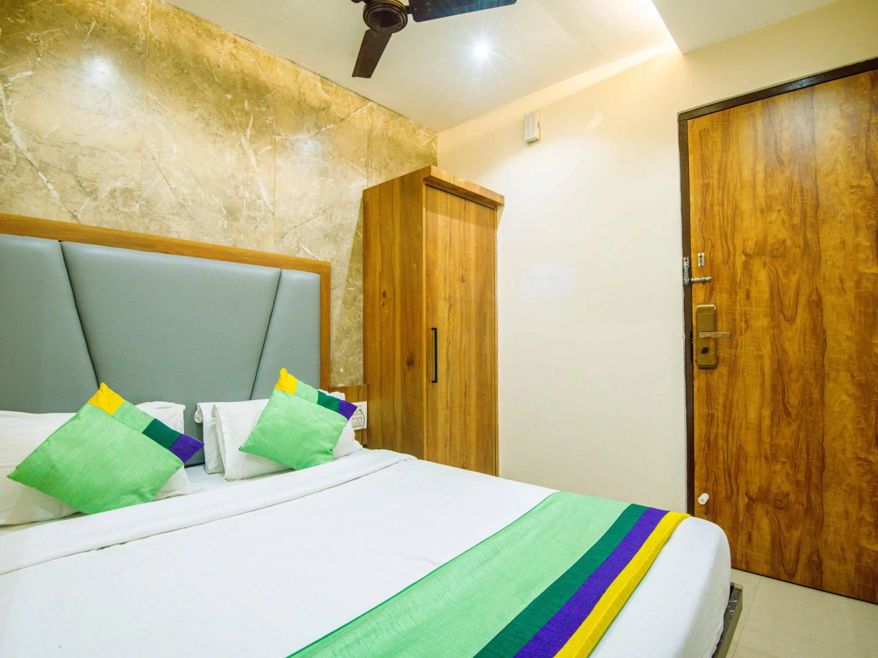 Bedroom, Bed in Treebo Amber Imperial