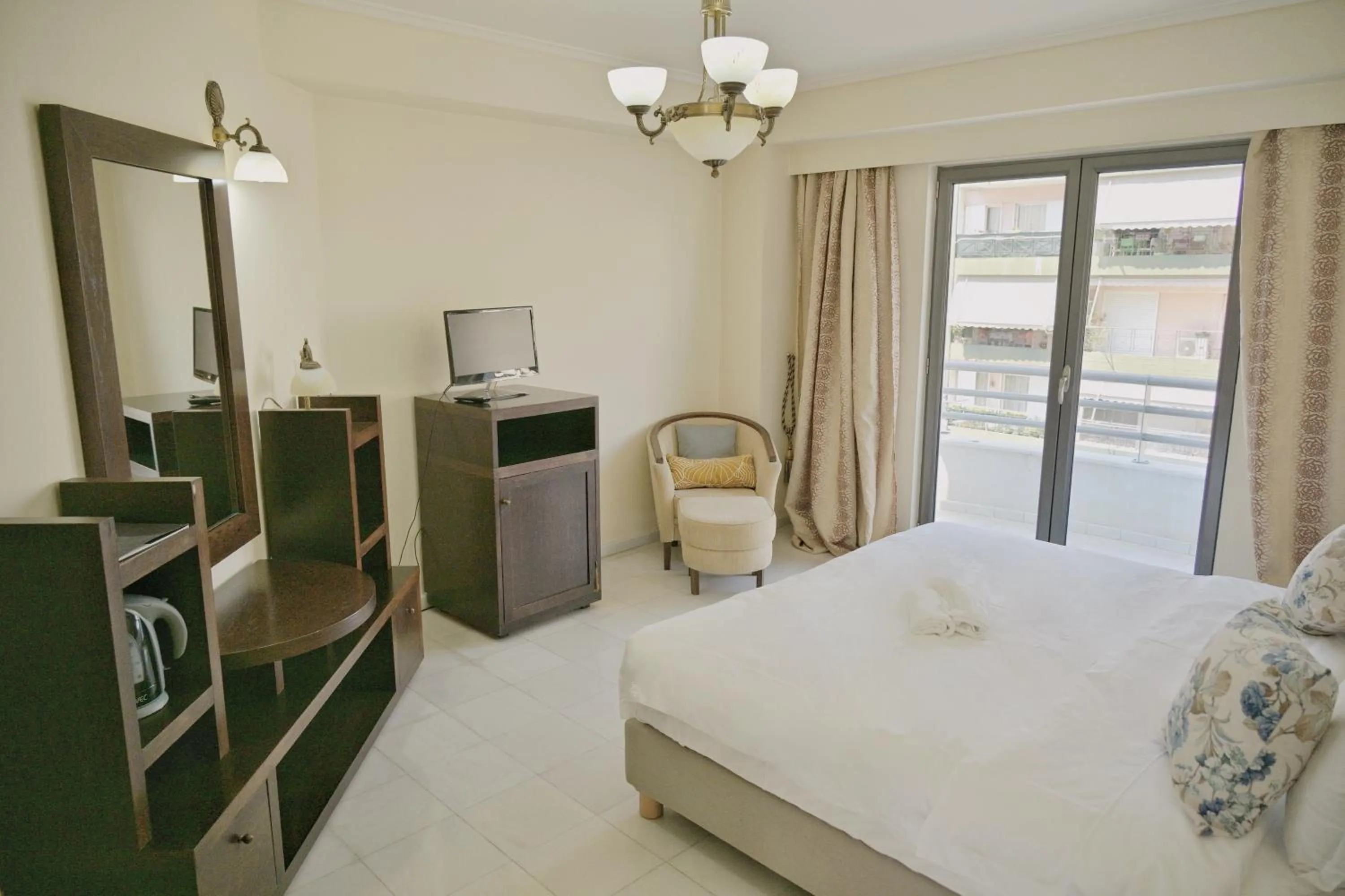 Photo of the whole room in New Times Home & Hotels Near Metro Station Athens Center