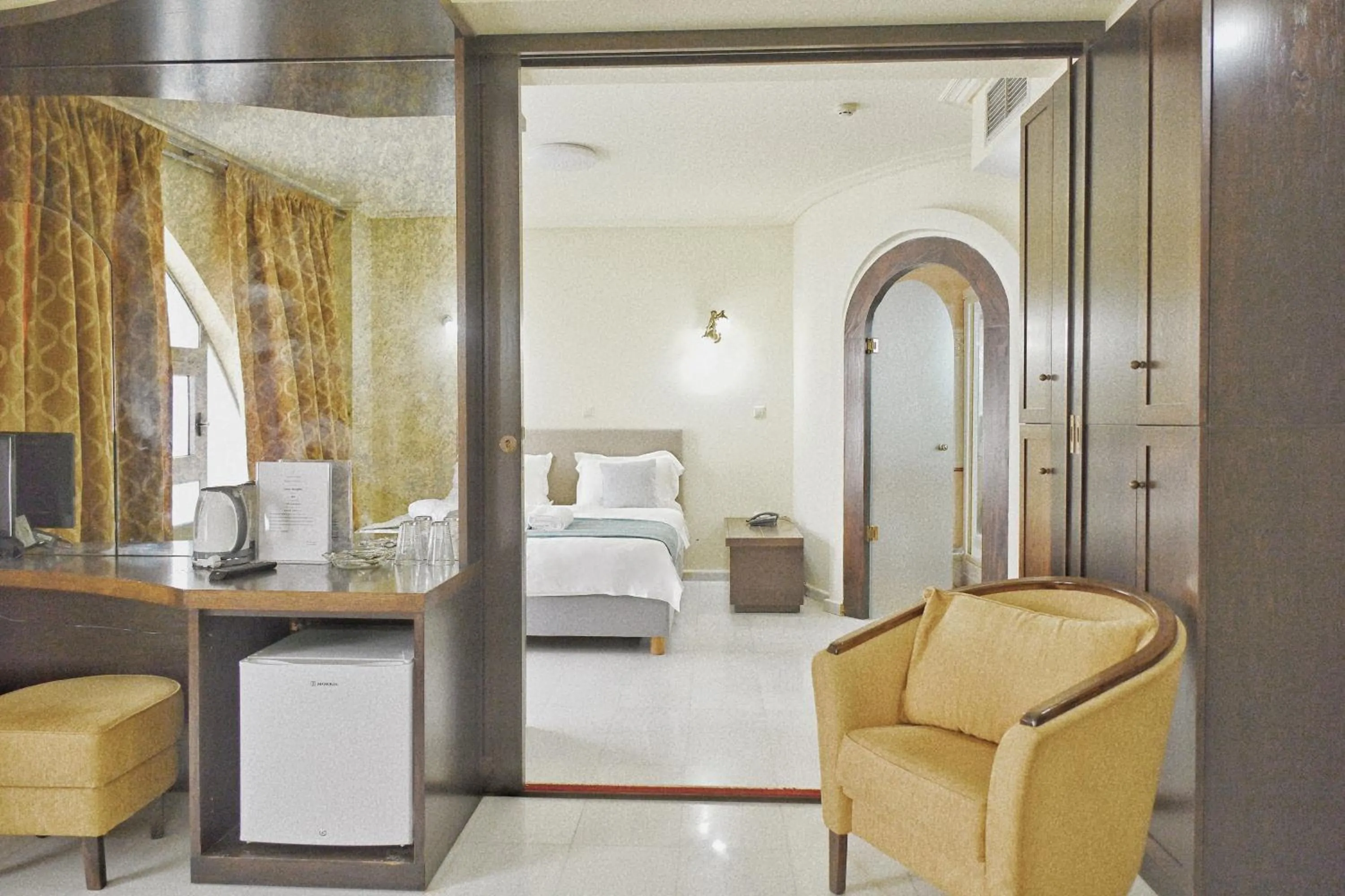 Seating area in New Times Home & Hotels Near Metro Station Athens Center