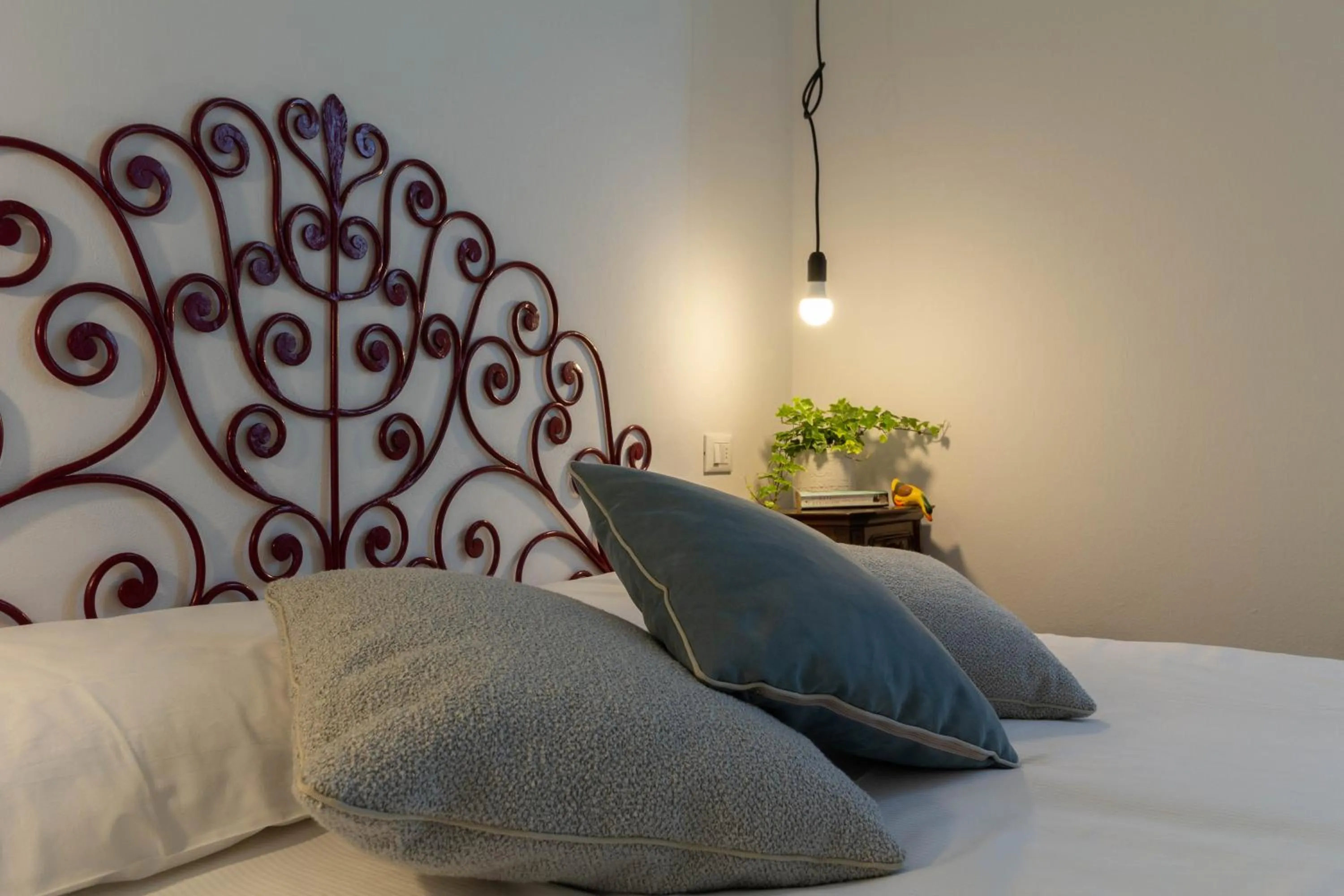 Bed in Mamma Ciccia Holiday Home - Waterfront Apartment