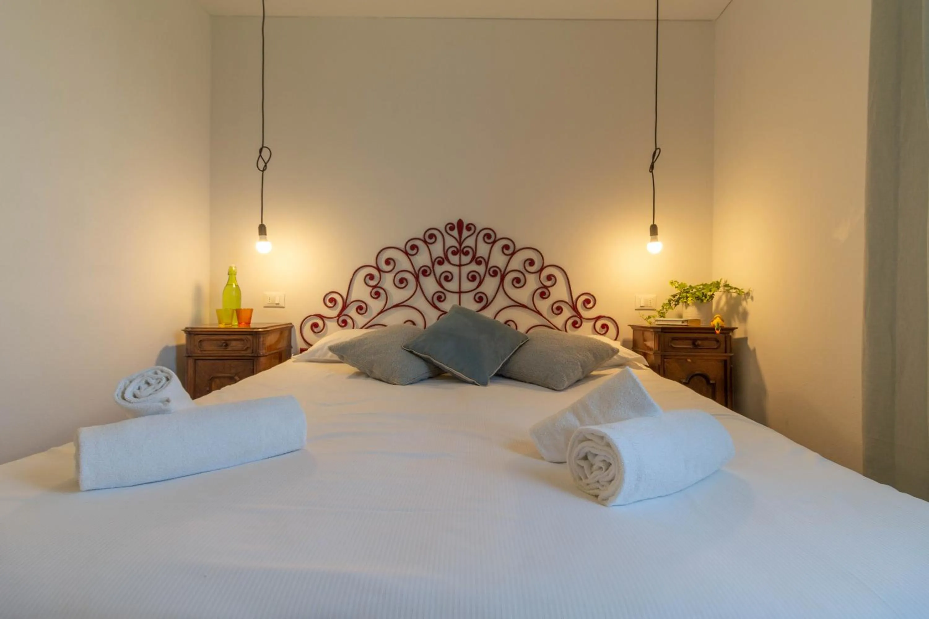 Bed in Mamma Ciccia Holiday Home - Waterfront Apartment