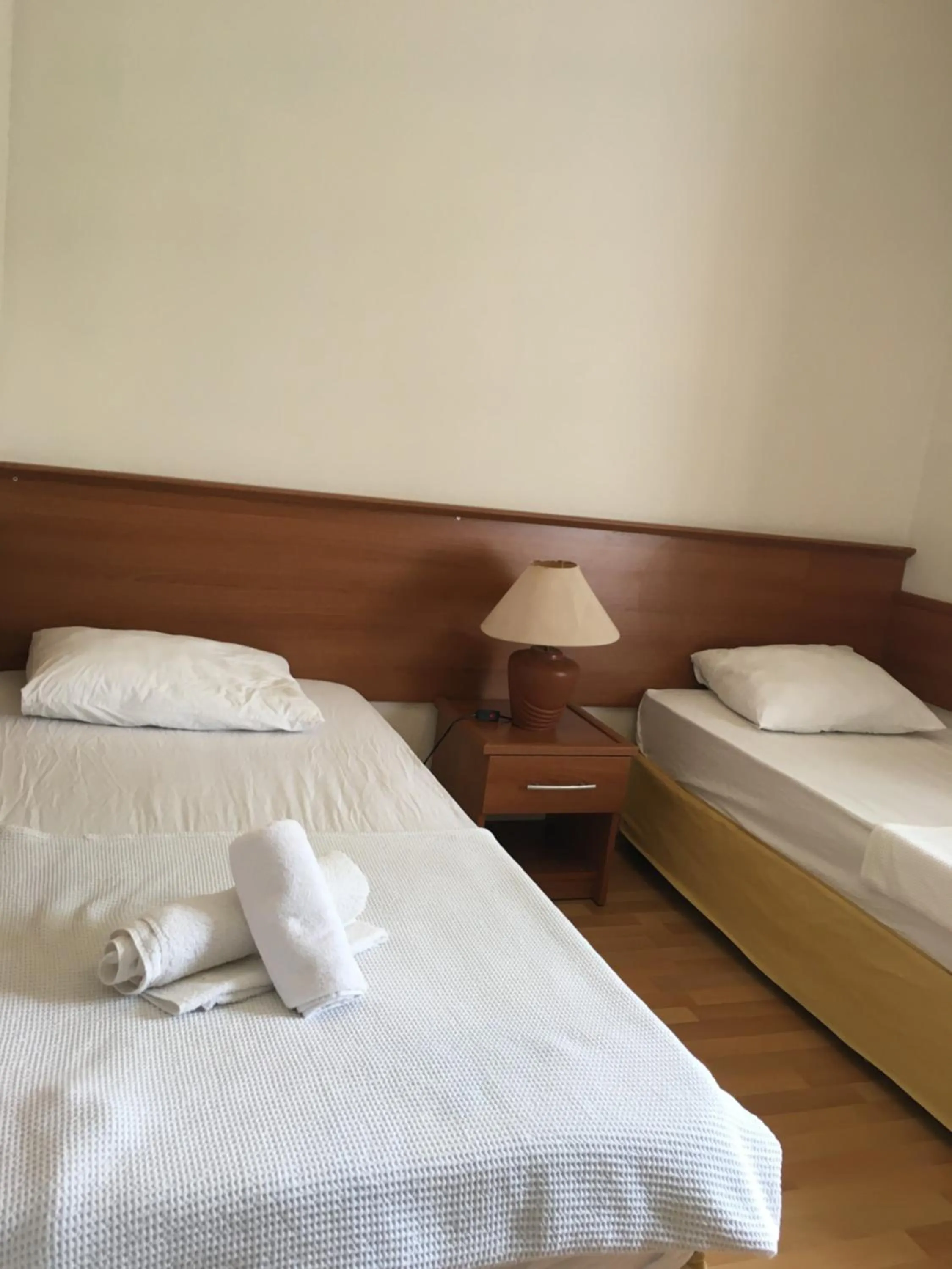 Bed in Felicity Hotel & Bungalows