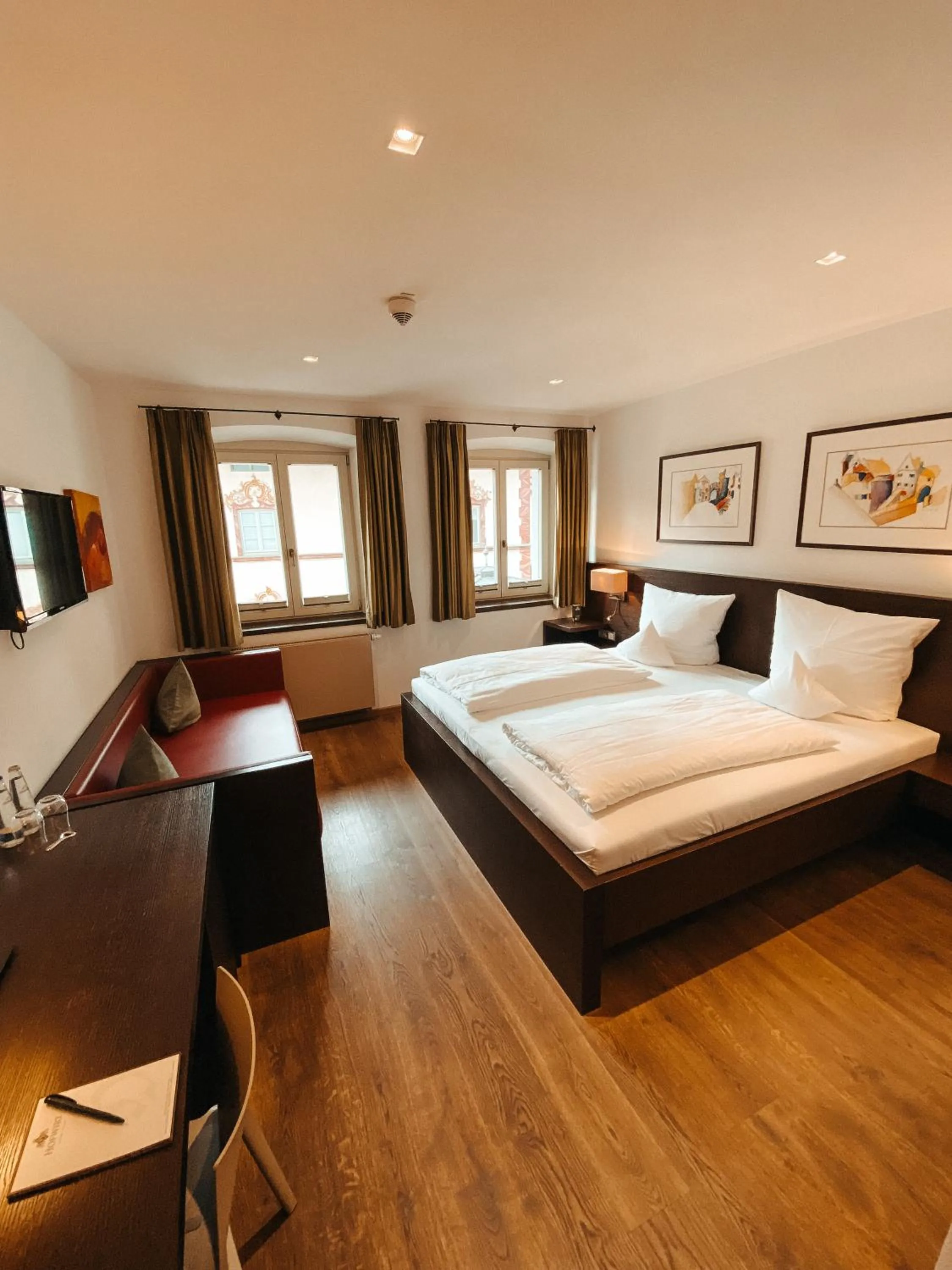 Photo of the whole room, Bed in Hotel Hofwirt Neubeuern