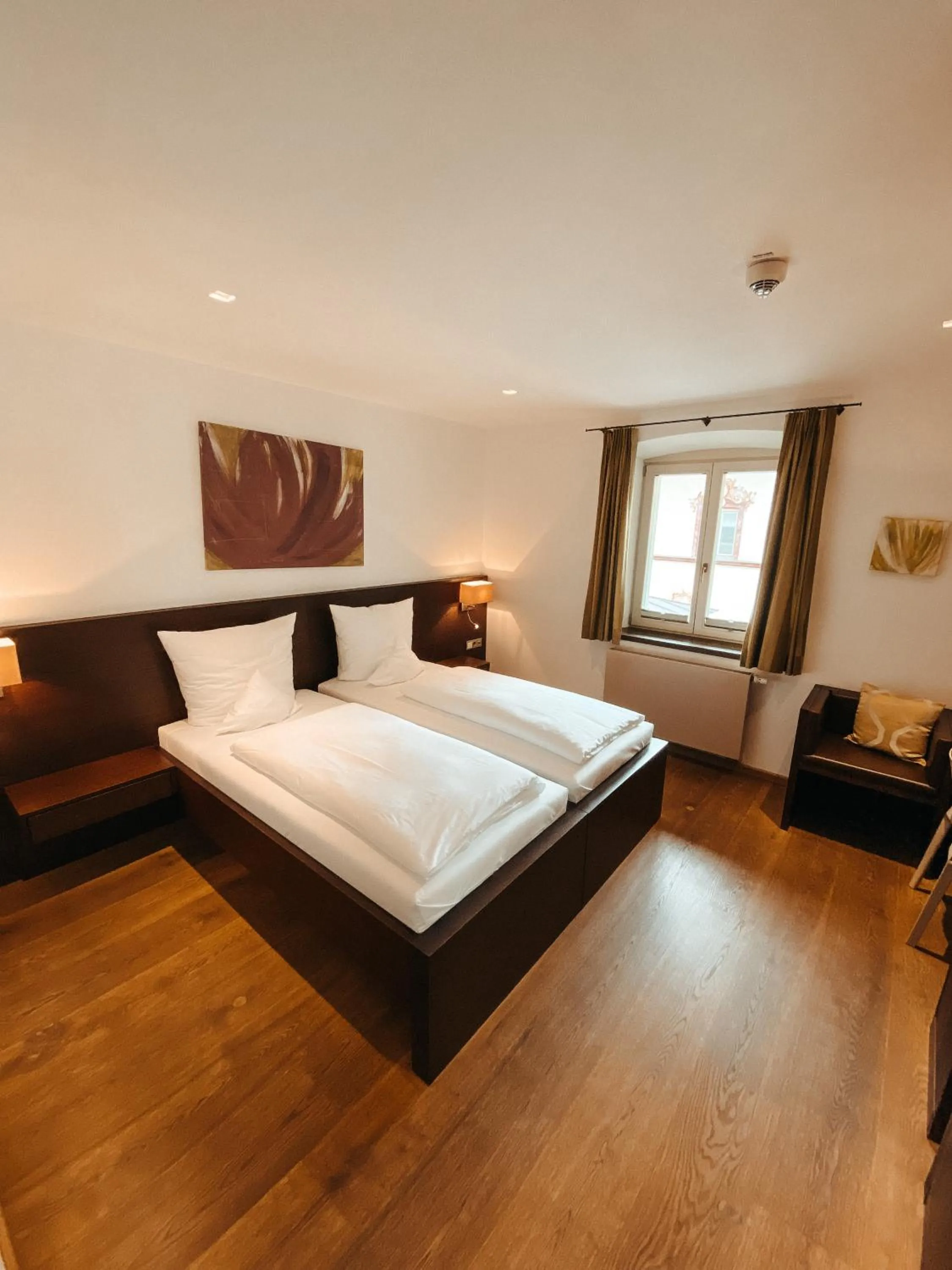 Photo of the whole room, Bed in Hotel Hofwirt Neubeuern