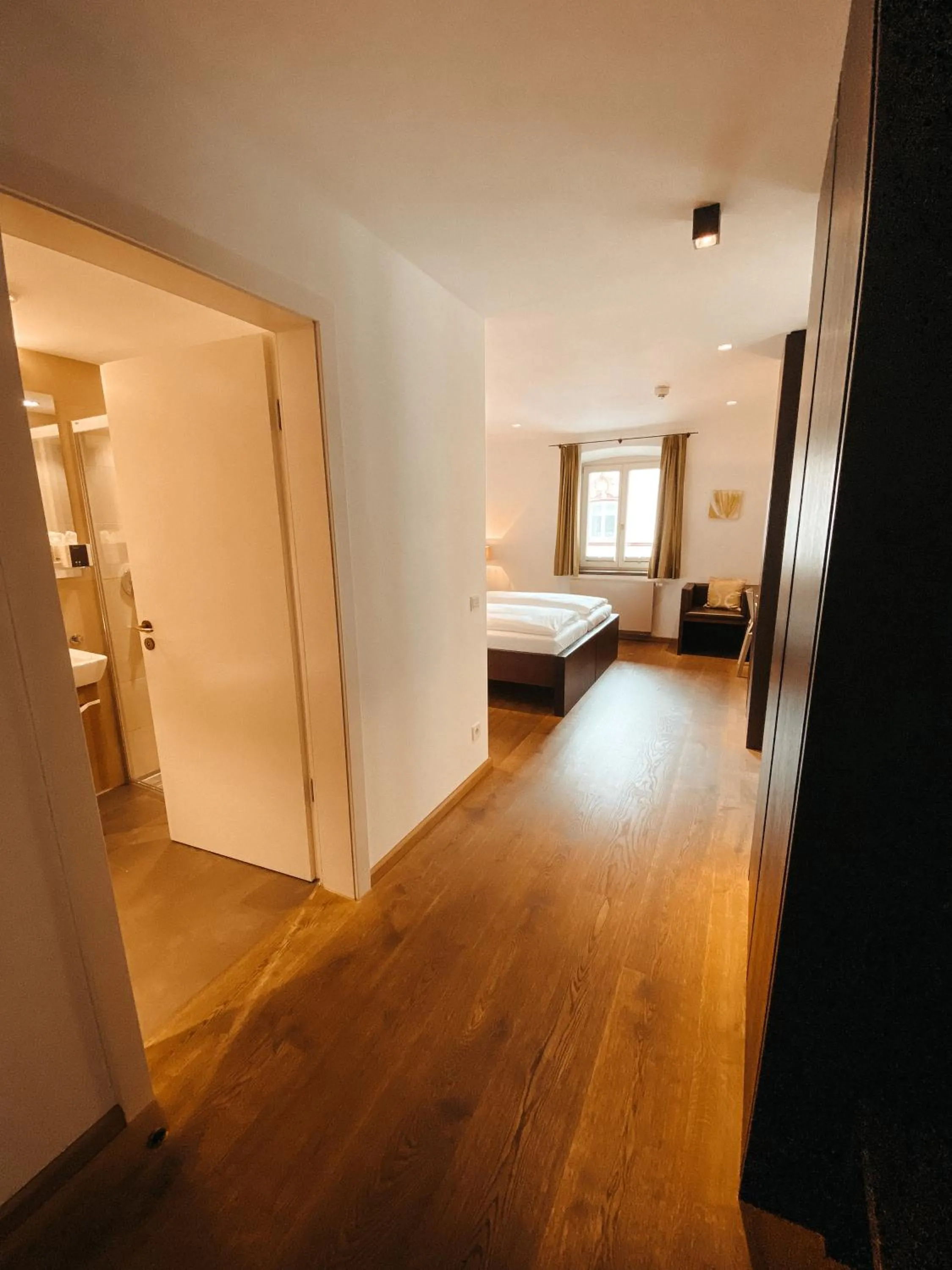 Photo of the whole room, Bed in Hotel Hofwirt Neubeuern