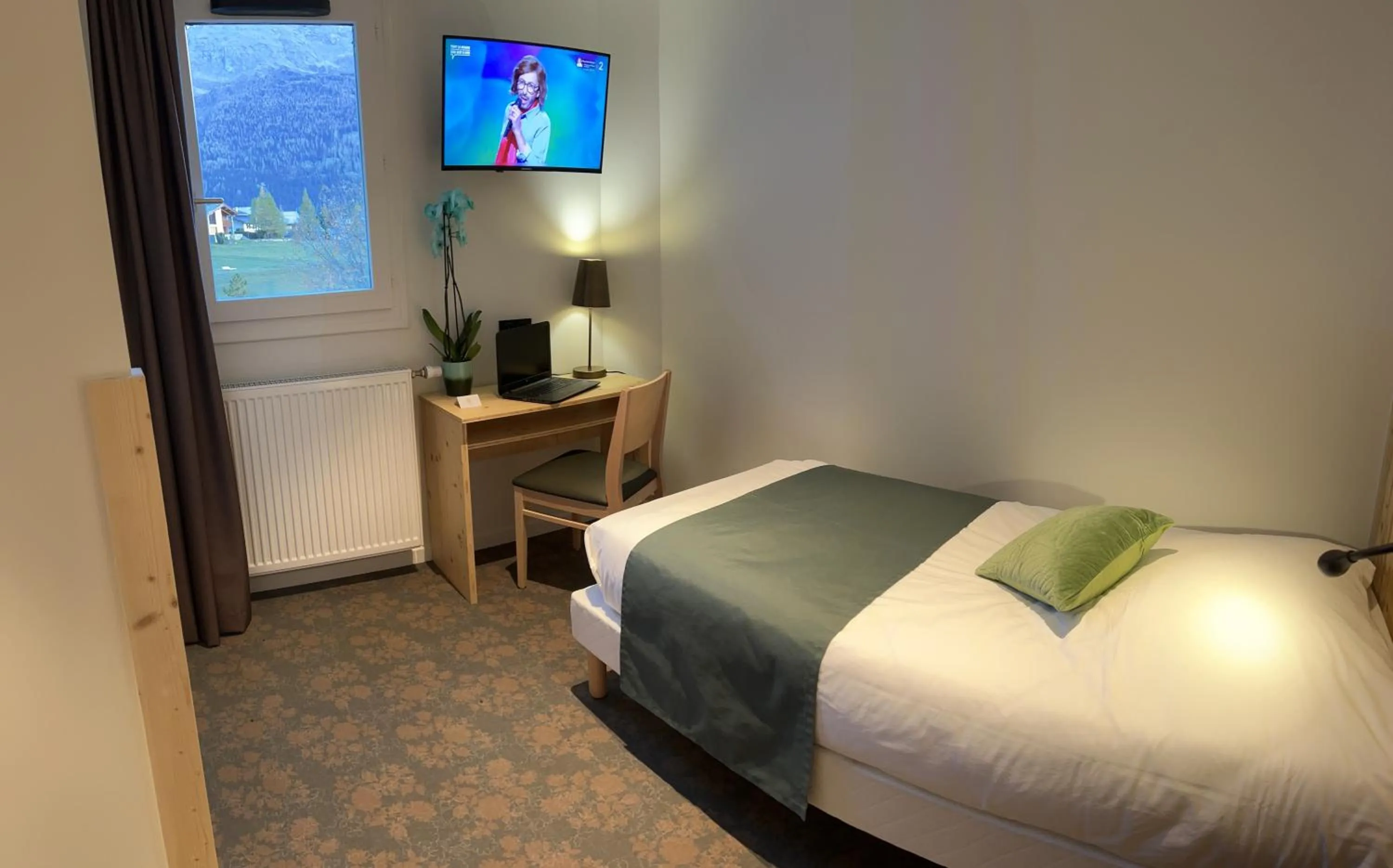 Bed in Village de vacances Fleurs et Neige