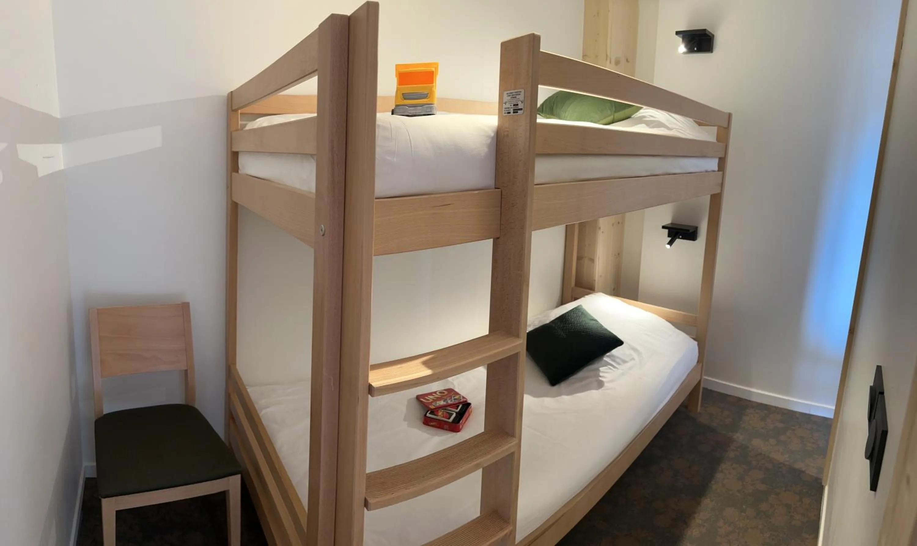 Bed in Village de vacances Fleurs et Neige