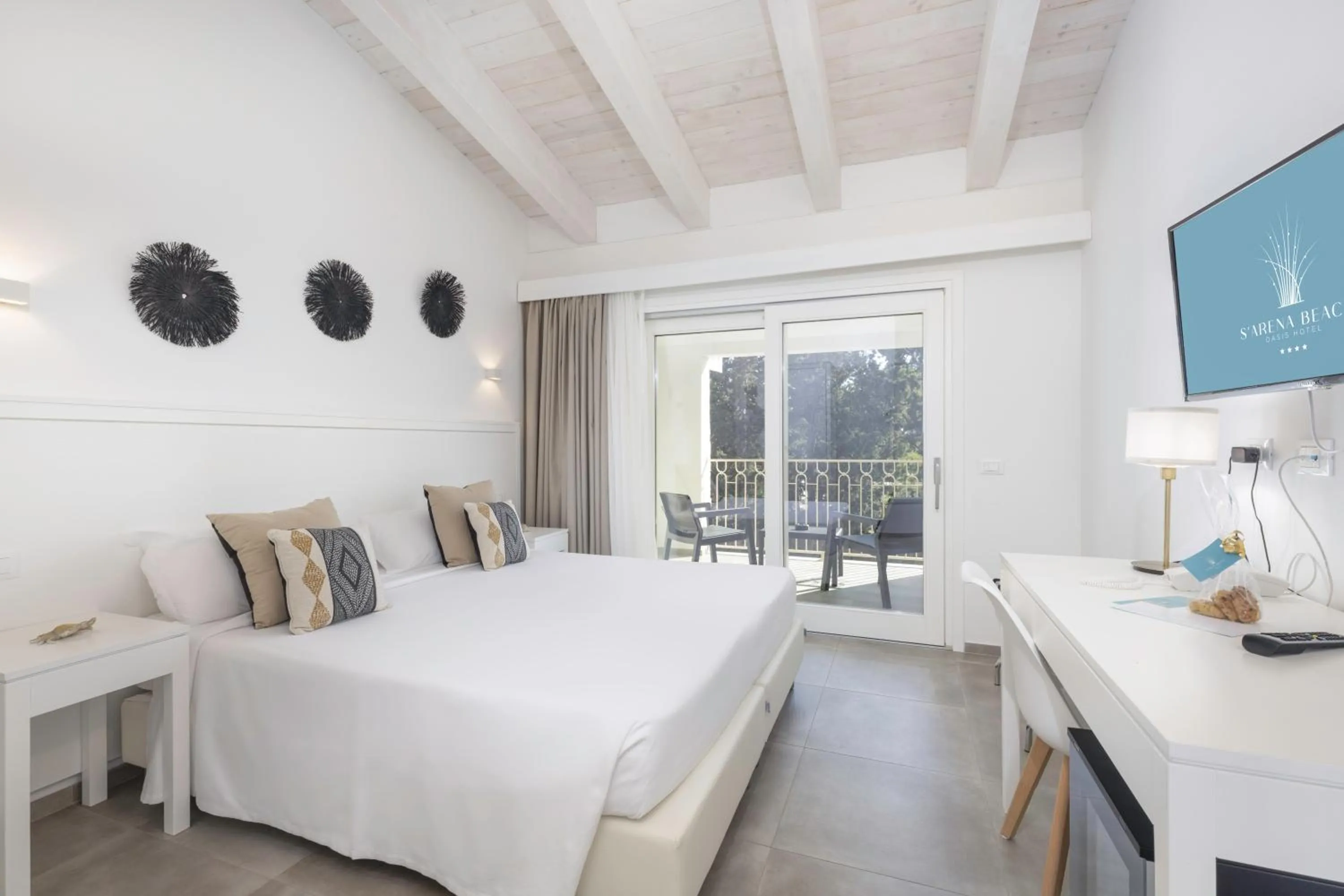 Bed in Hotel S'arena Beach