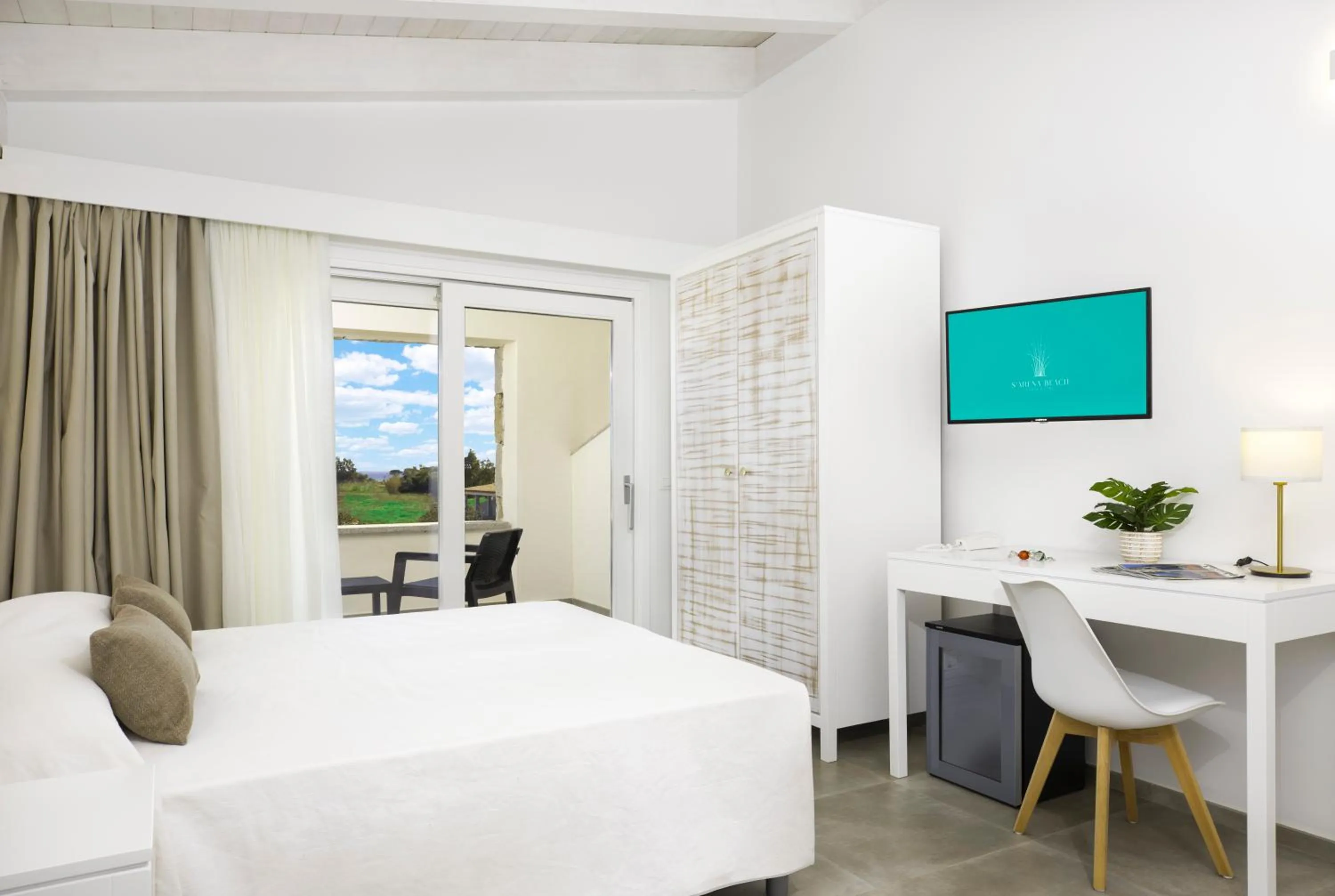 Bed in Hotel S'arena Beach