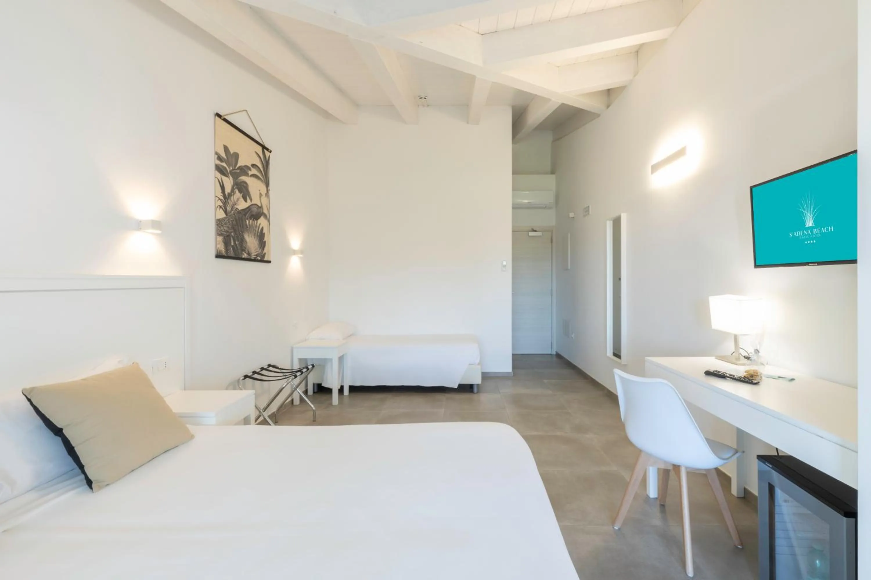 Bed in Hotel S'arena Beach