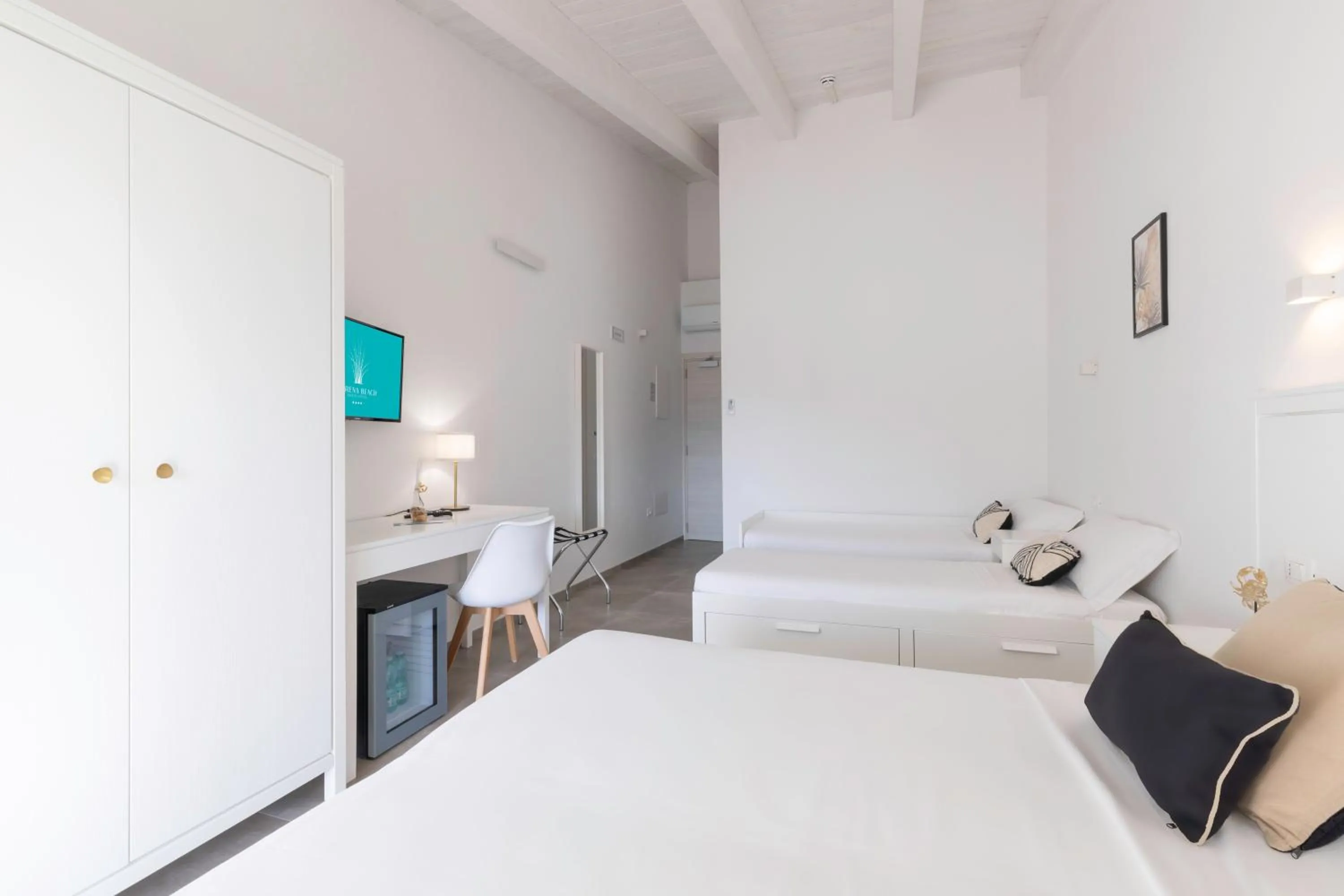 Bed in Hotel S'arena Beach