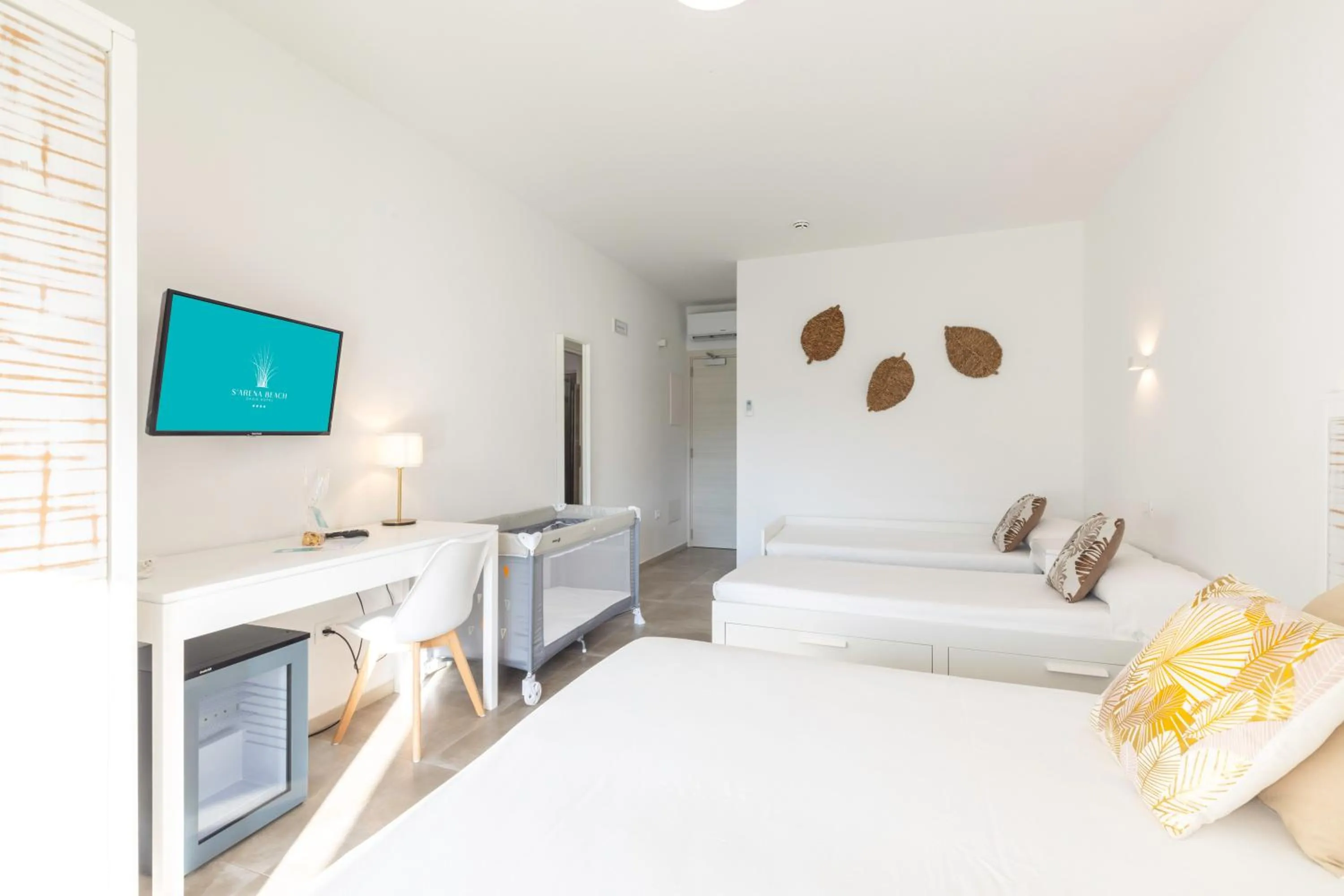 Bed in Hotel S'arena Beach