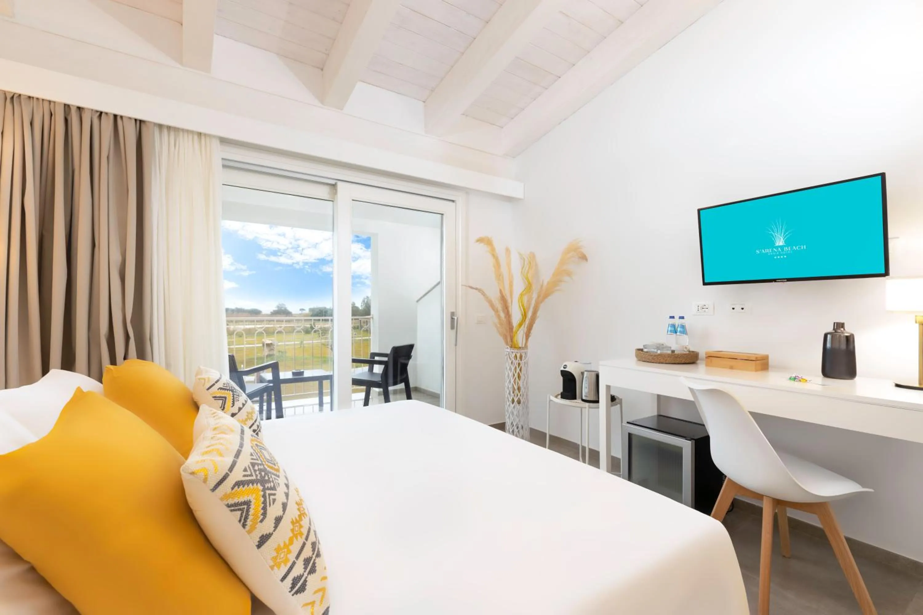 Bed in Hotel S'arena Beach