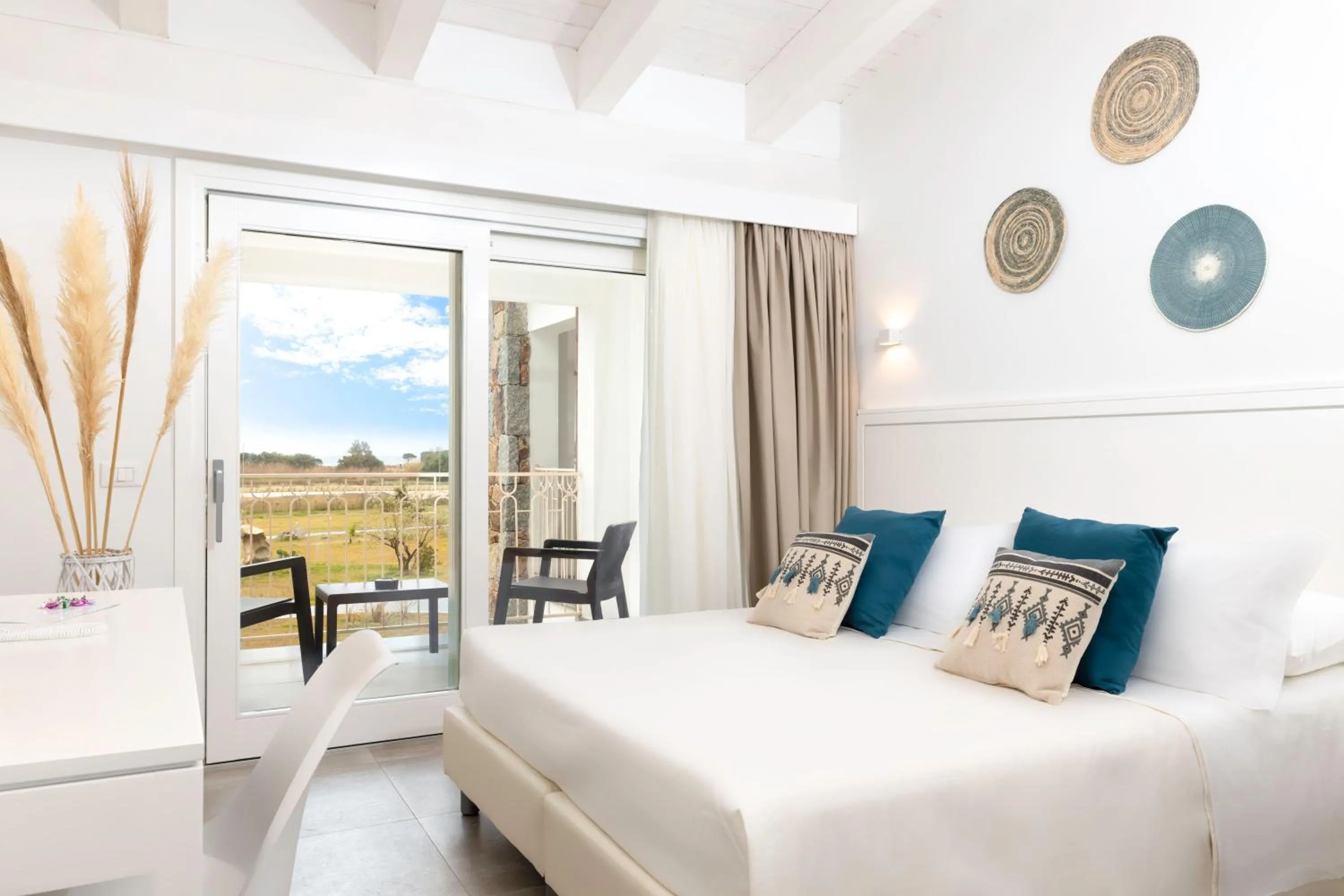 Bed in Hotel S'arena Beach