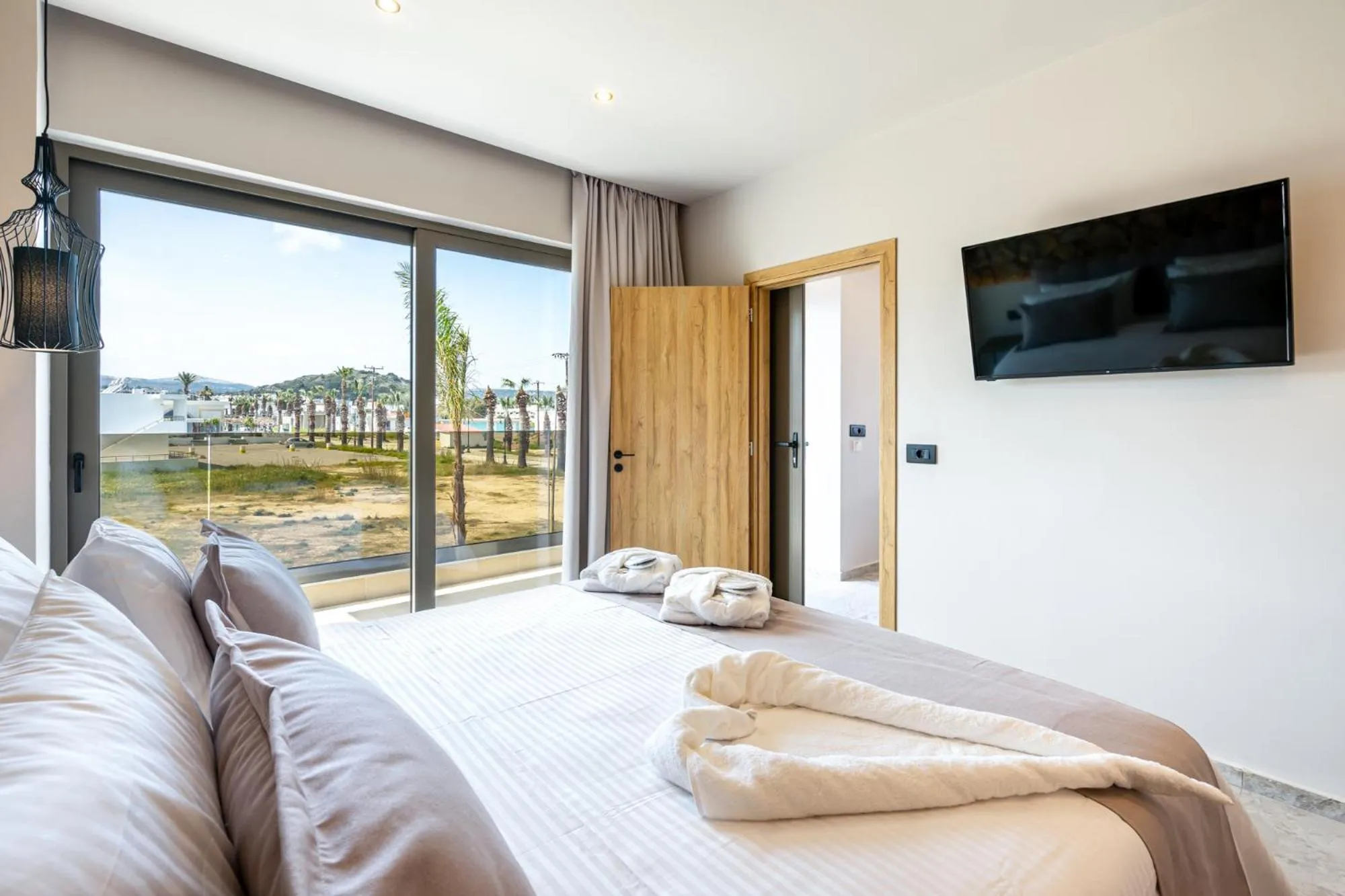 TV and multimedia, Bed in Pathos SeaSide Suites