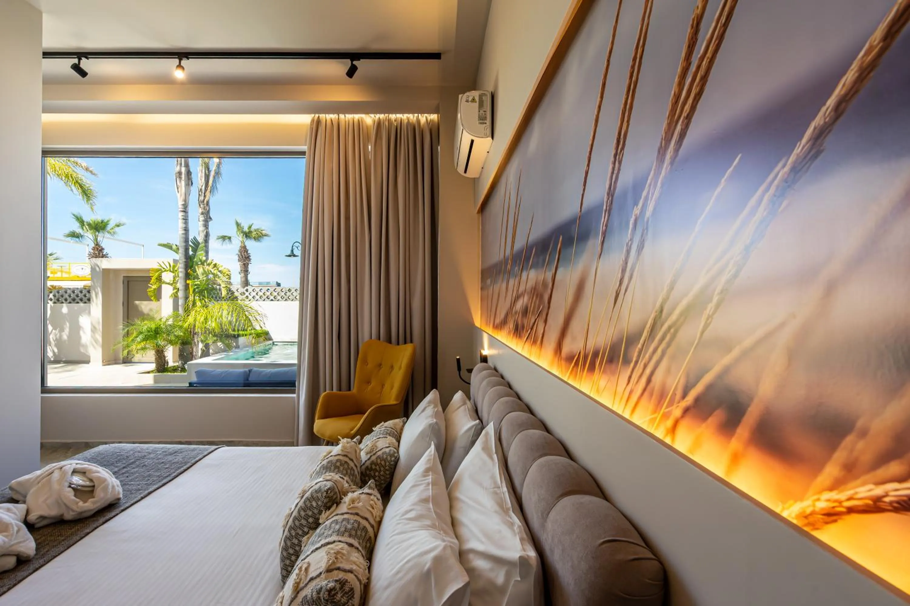 Bed in Pathos SeaSide Suites