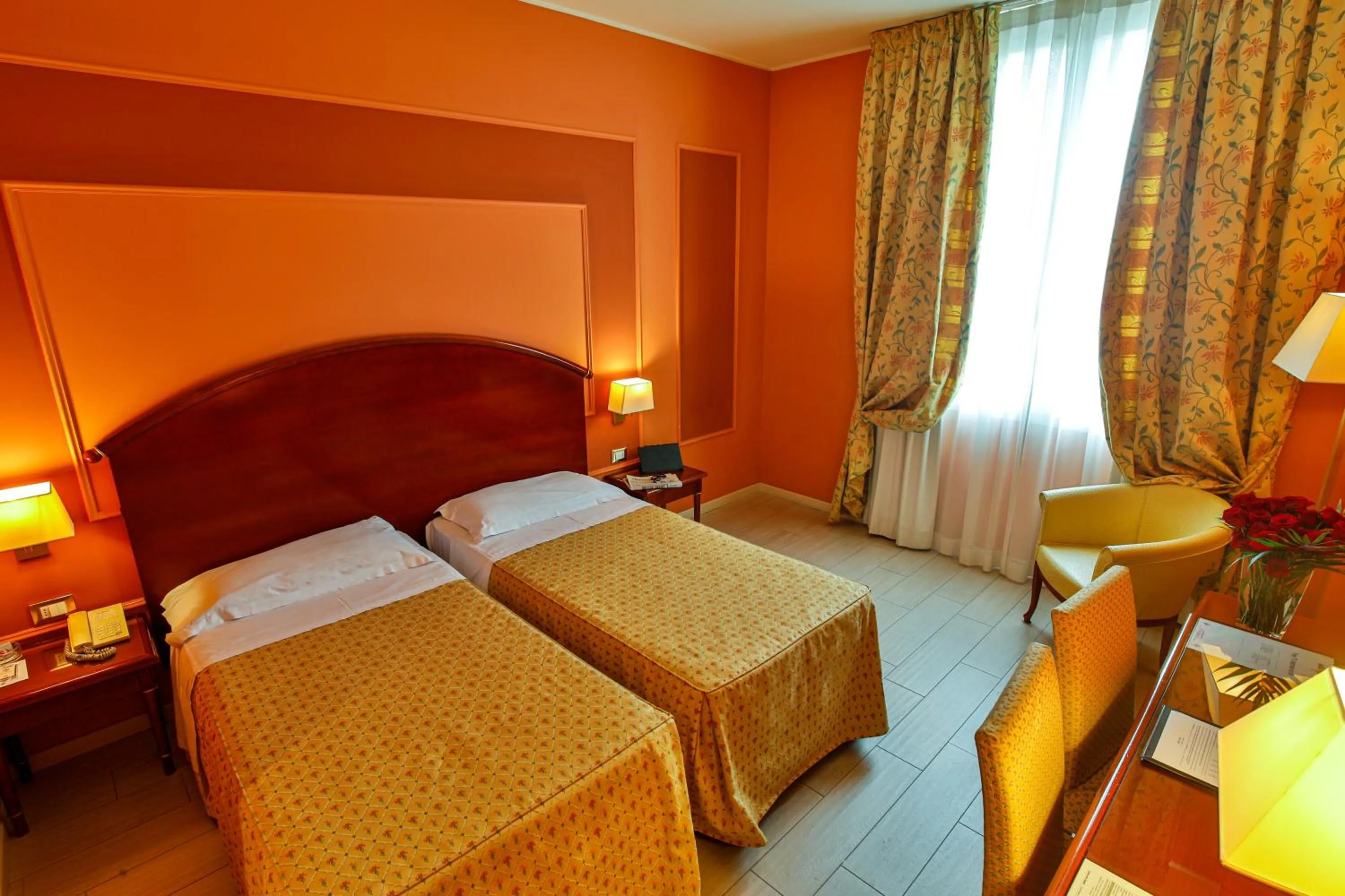 Bed in Savoia Hotel Regency