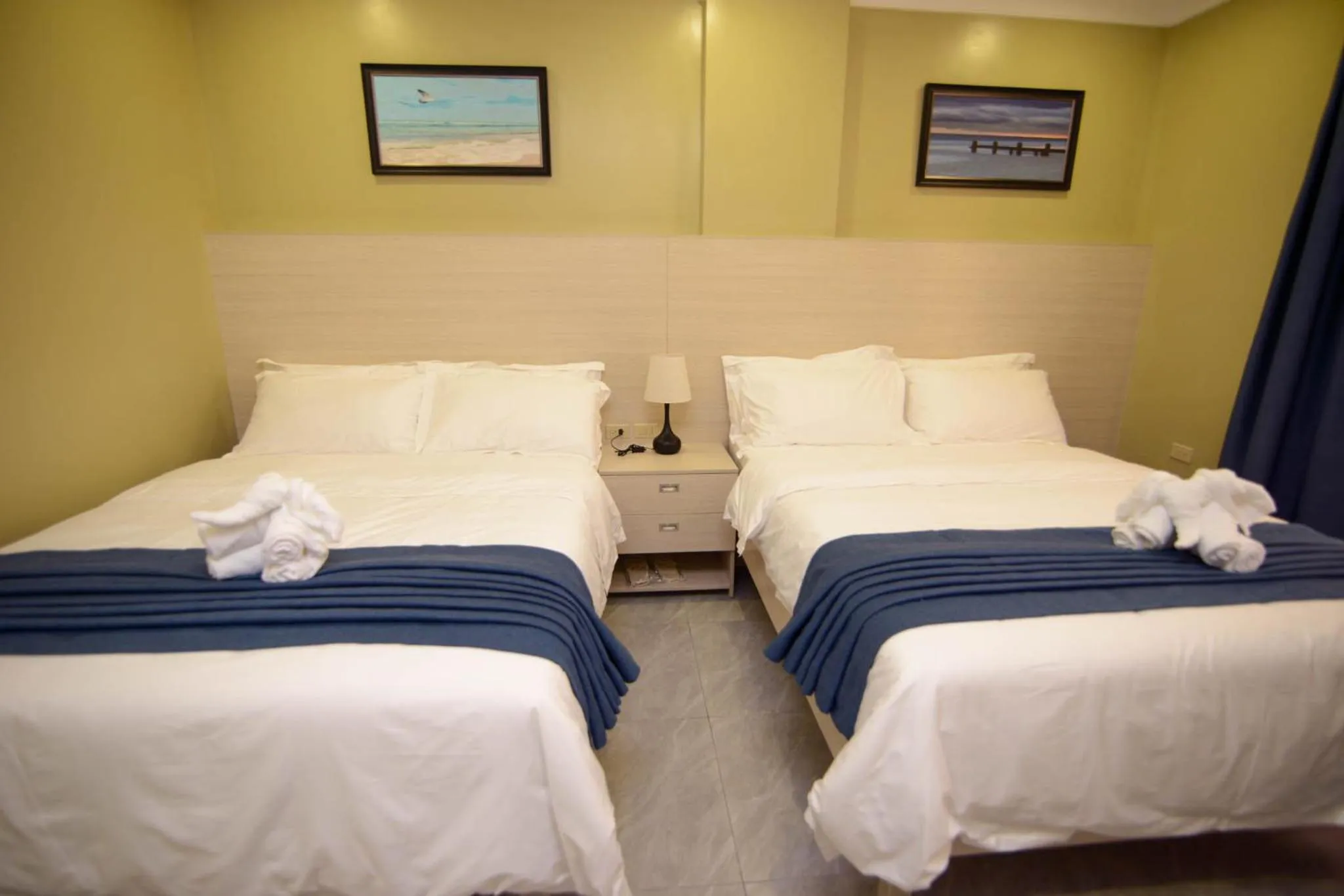 Bed in The Caye Hotel Caye Caulker