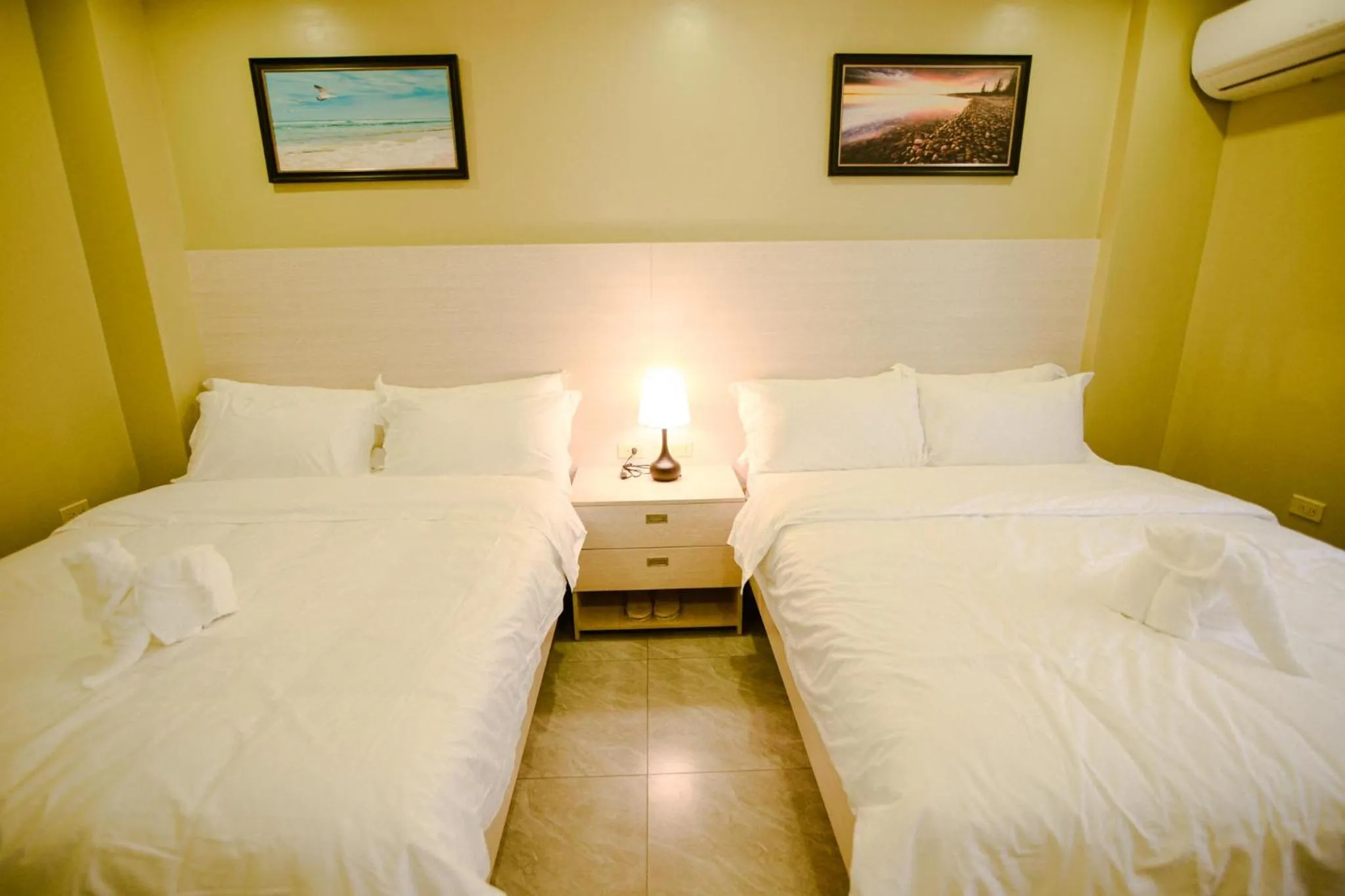 Photo of the whole room, Bed in The Caye Hotel Caye Caulker