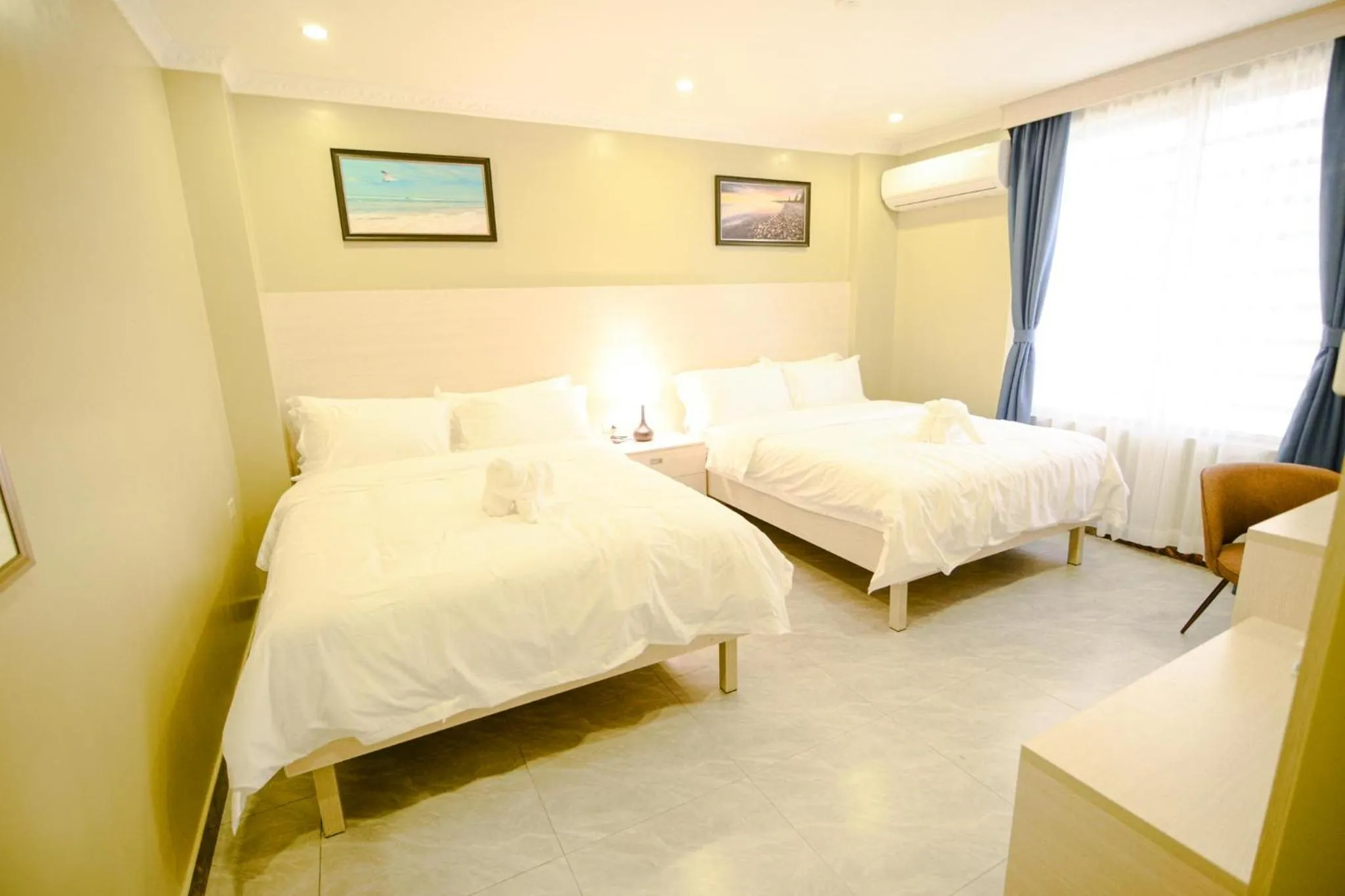 Photo of the whole room, Bed in The Caye Hotel Caye Caulker