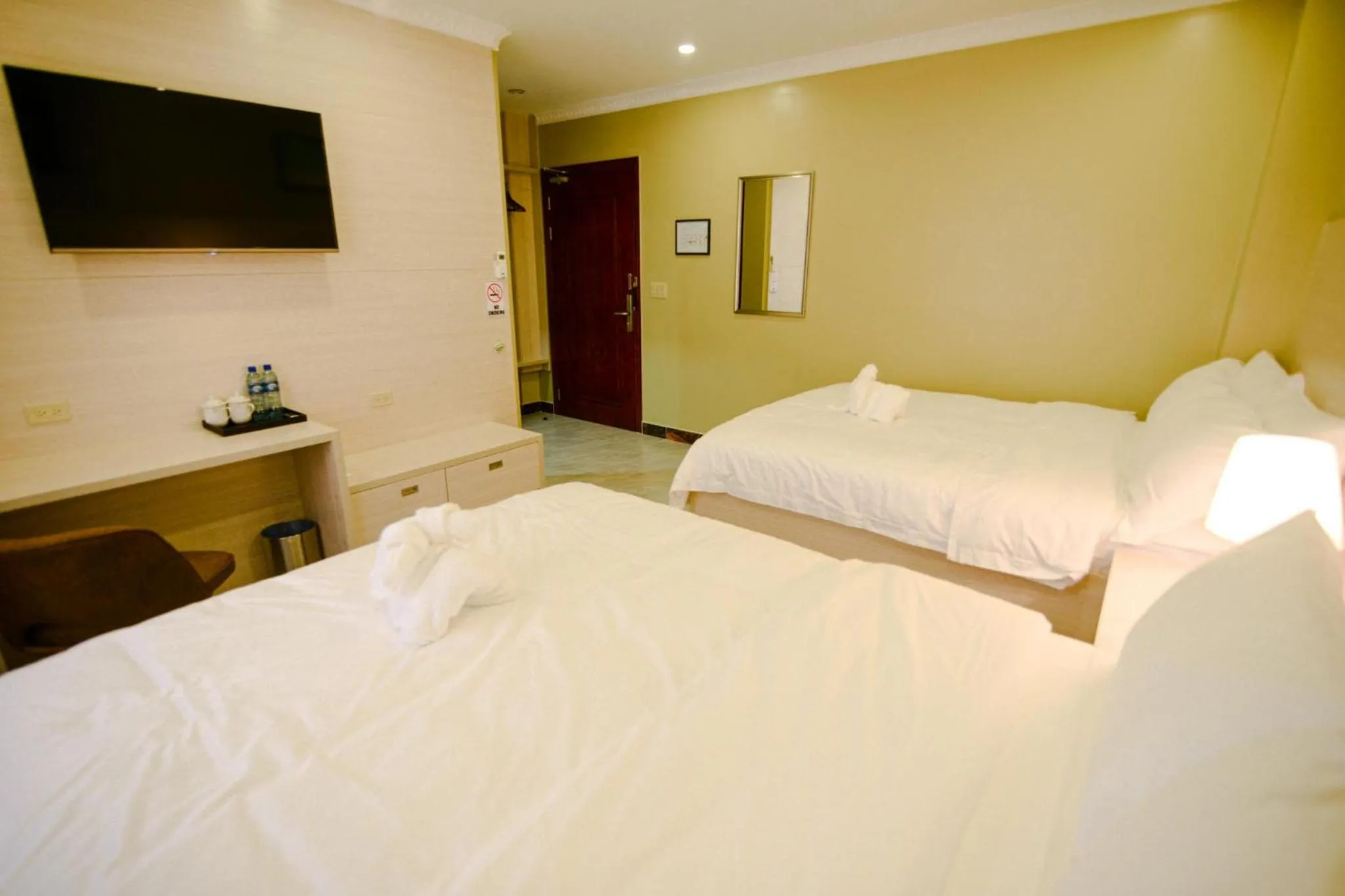 TV and multimedia, Bed in The Caye Hotel Caye Caulker