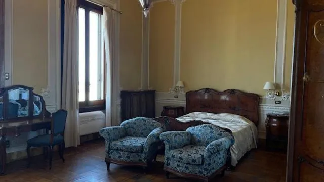 Bed in Villa Tina Hotel