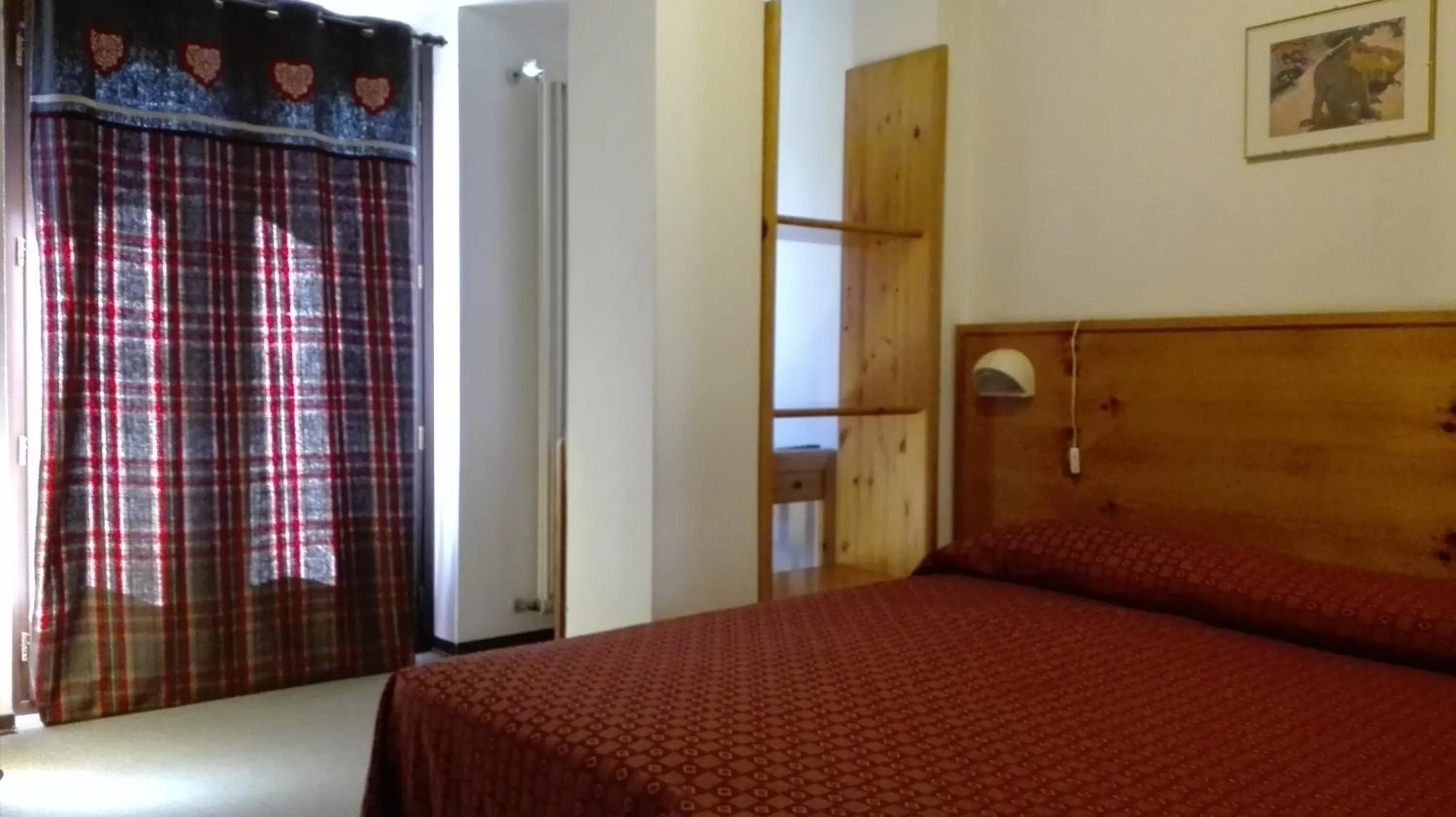 Bed in Hotel Saint Nicolas Gran Paradiso