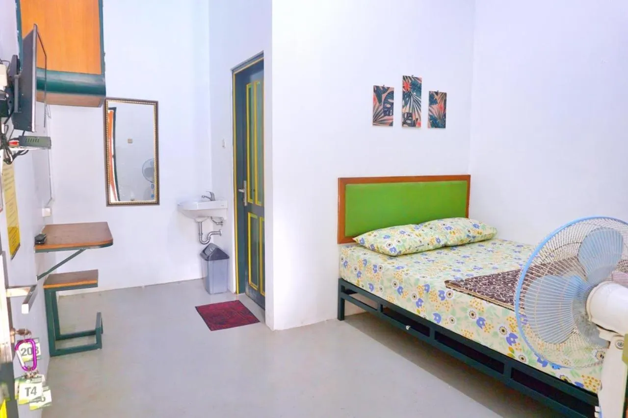 Bed in Sonosewu Guesthouse Syariah