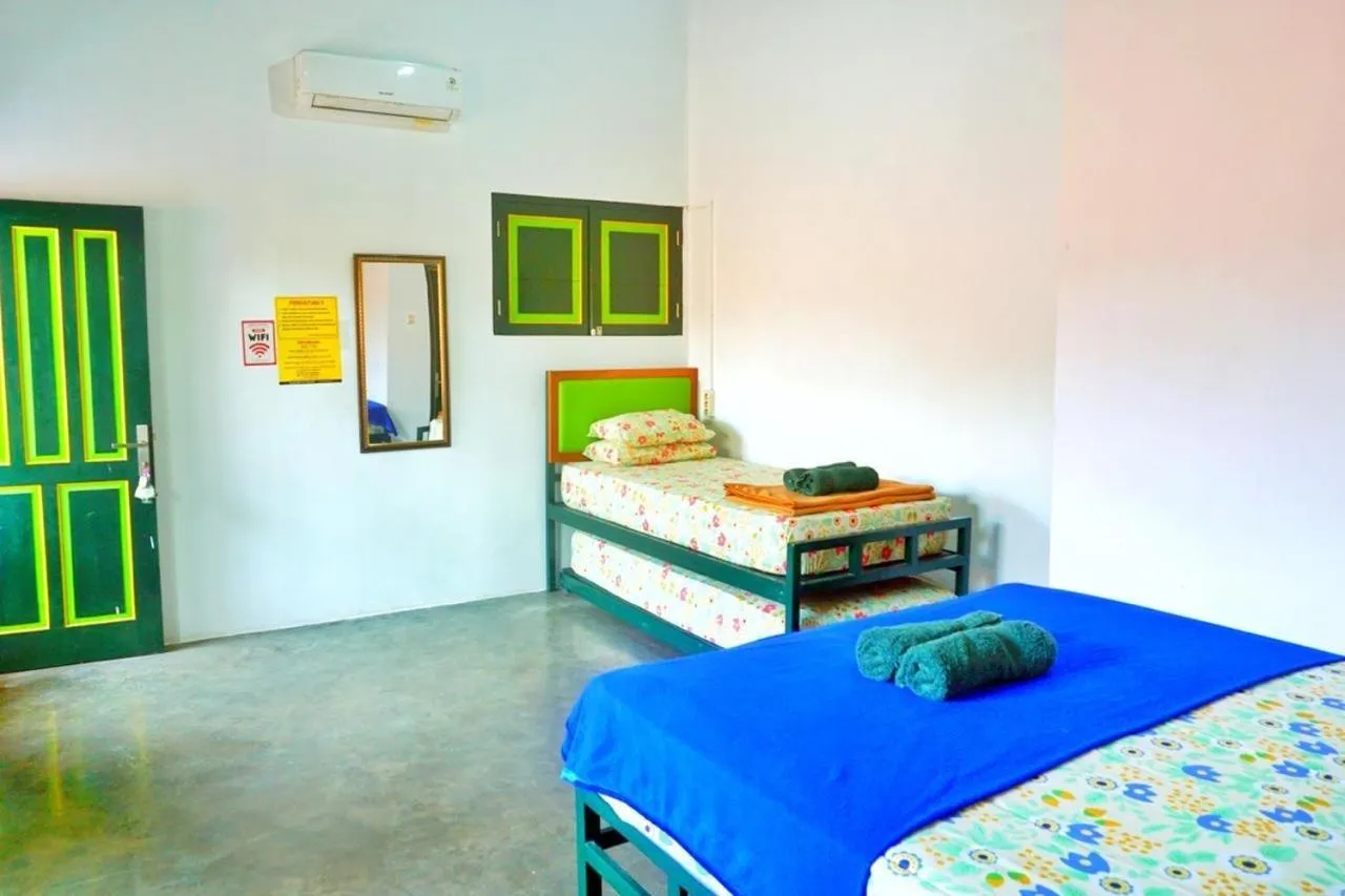 Bed in Sonosewu Guesthouse Syariah